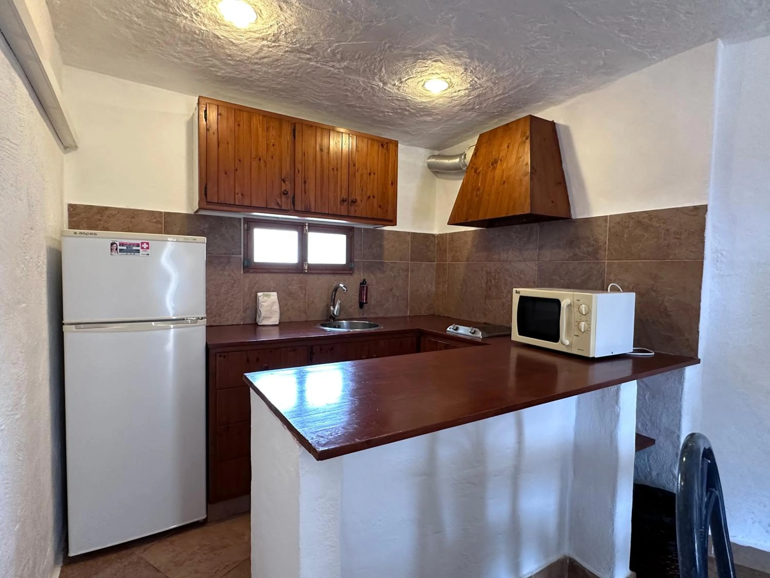 Kitchen or kitchenette in Binivell Park - 30º apartments
