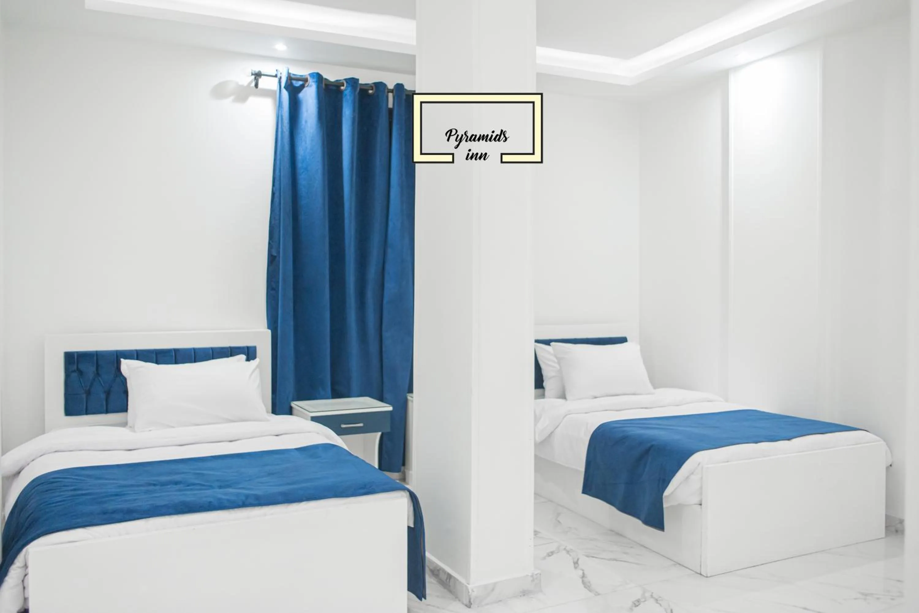 Bedroom in PR Pyramids Inn