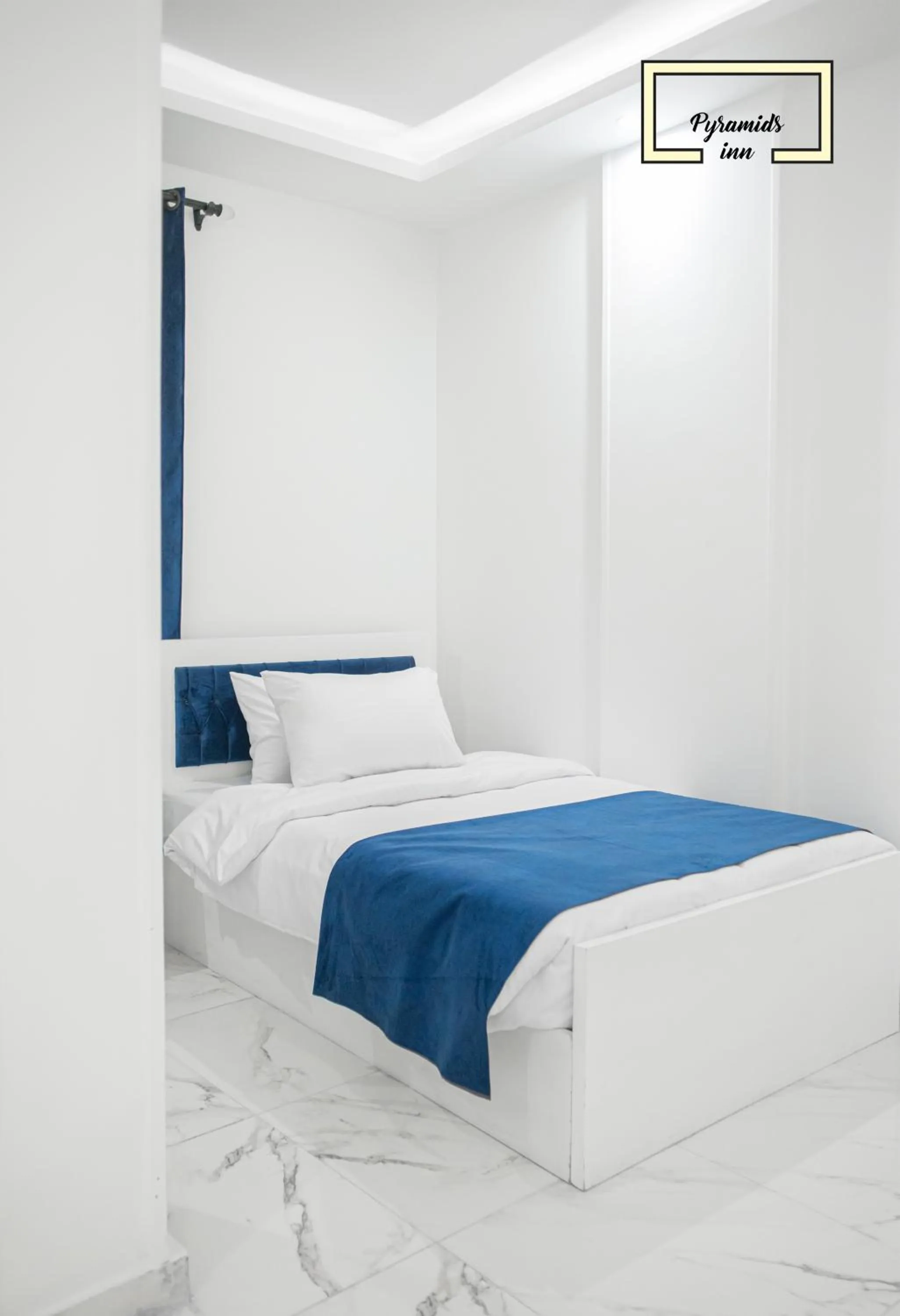 Bed in PR Pyramids Inn