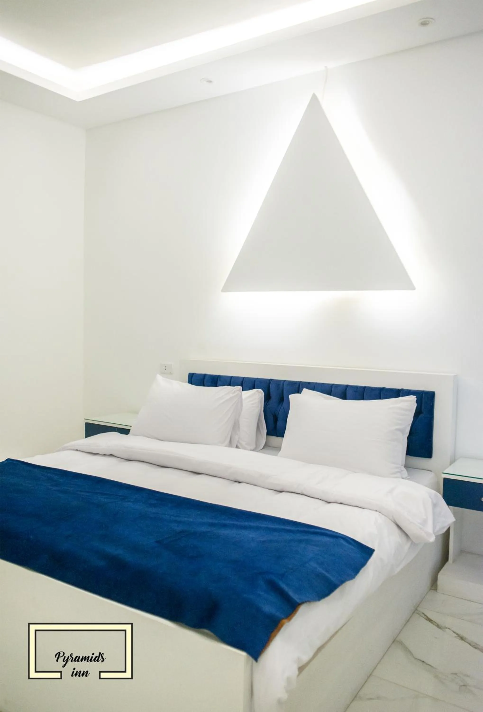 Bedroom in PR Pyramids Inn