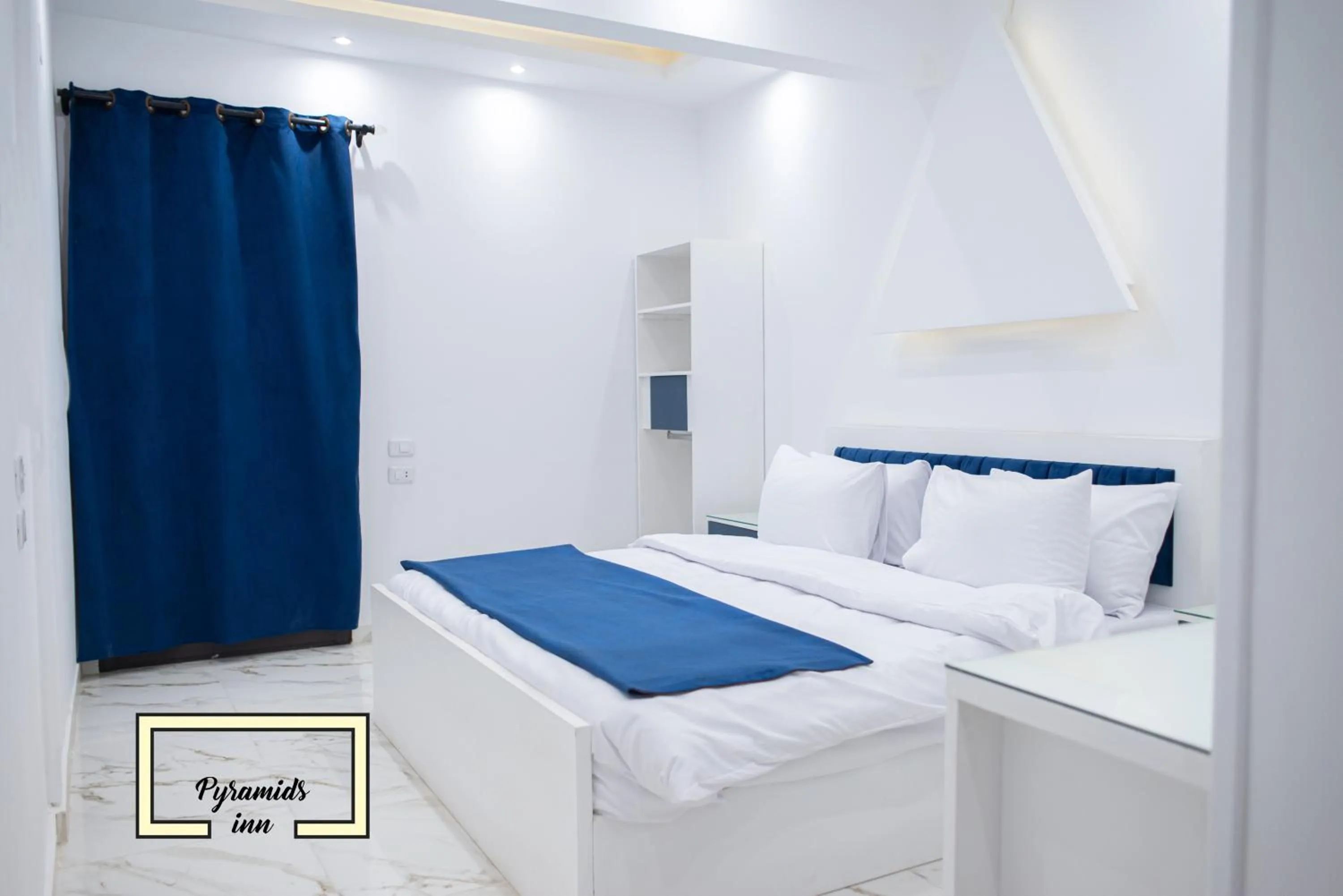 Photo of the whole room in PR Pyramids Inn