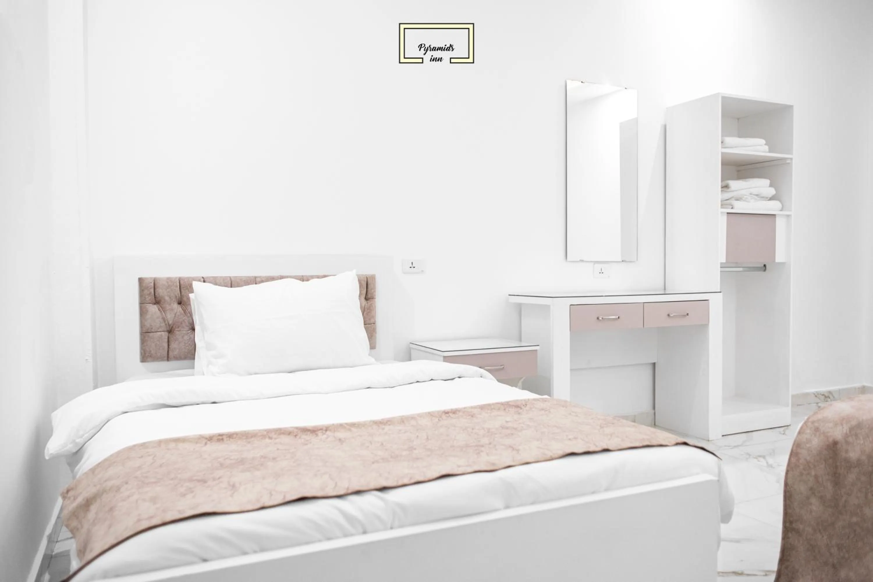 Bed in PR Pyramids Inn