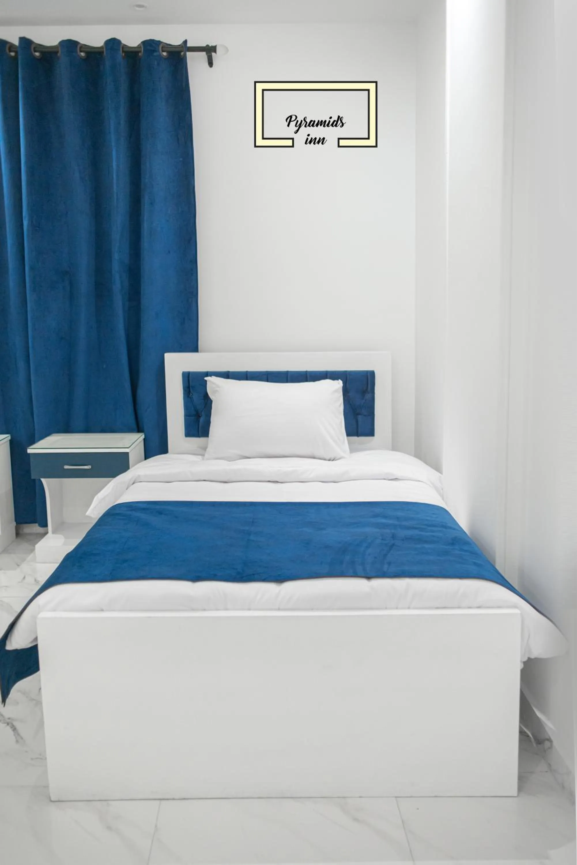 Bed in PR Pyramids Inn