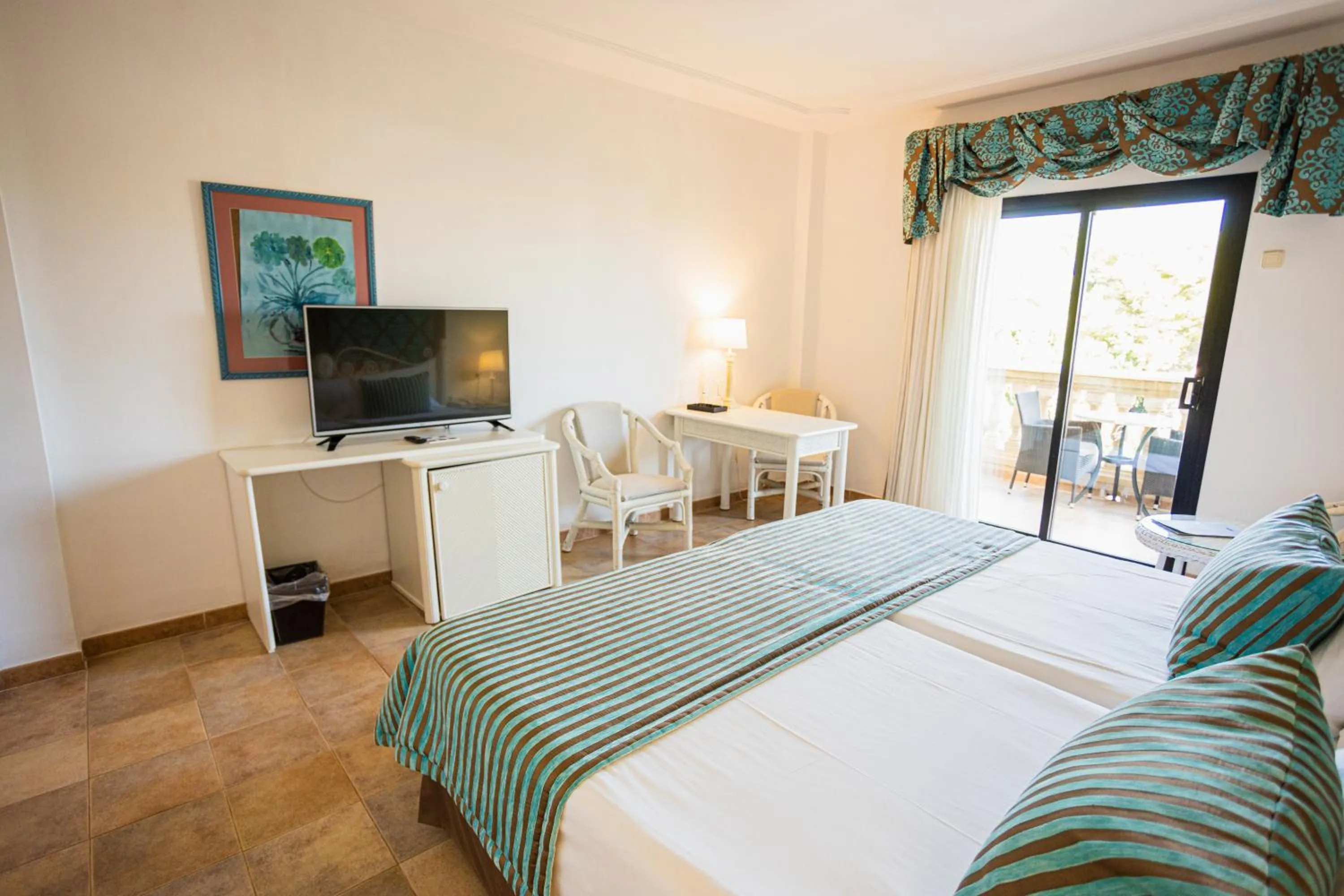 Bed in Lago Garden Apart-Suites & Spa Hotel