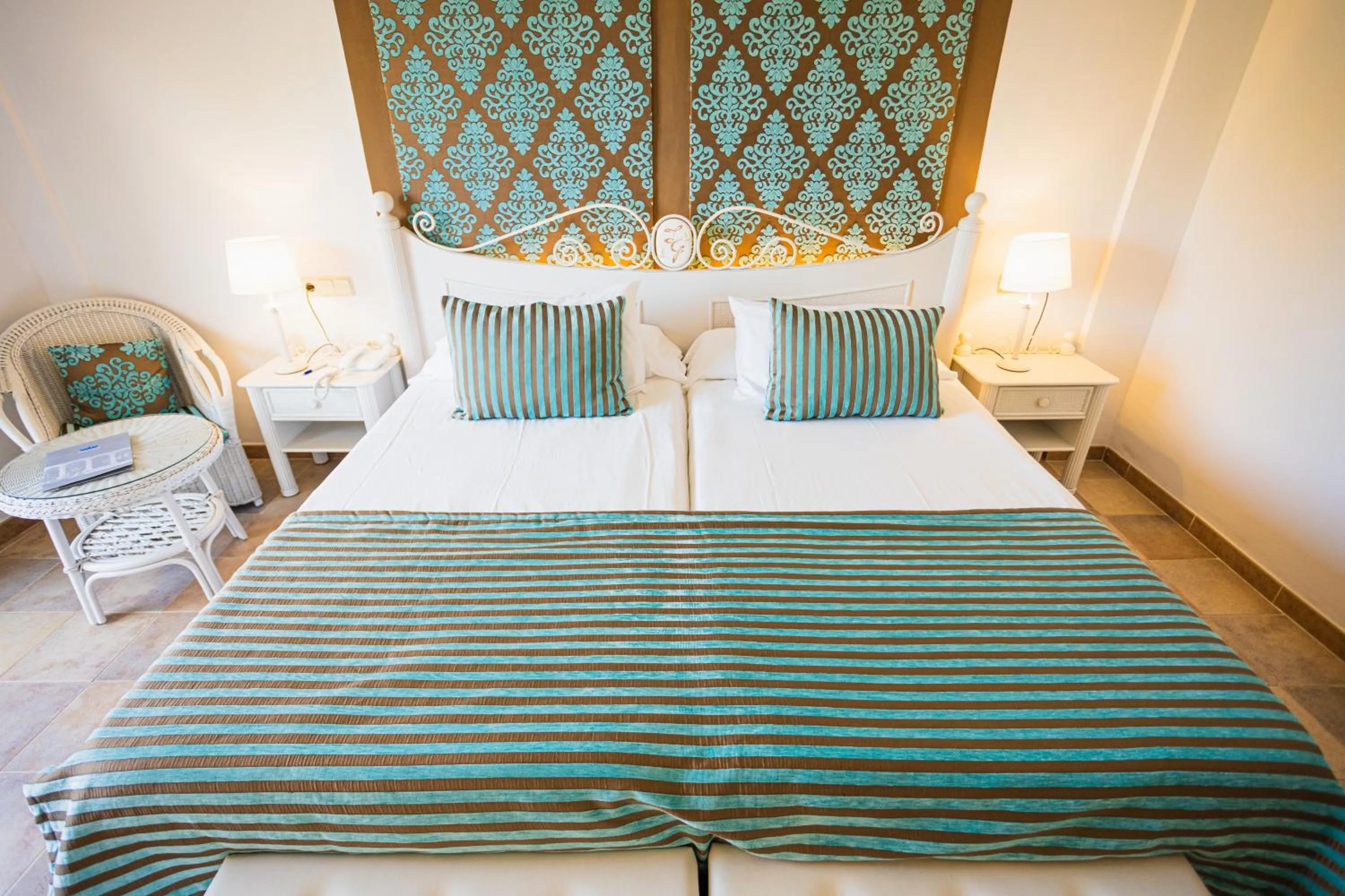 Bed in Lago Garden Apart-Suites & Spa Hotel