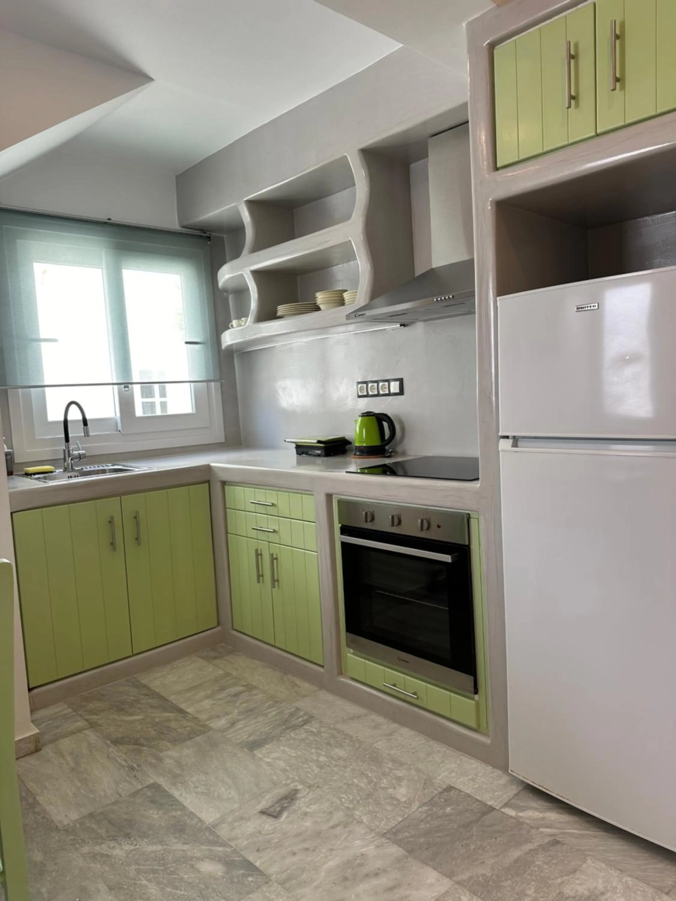 Kitchen or kitchenette in Aphrodite Hotel & Apartments