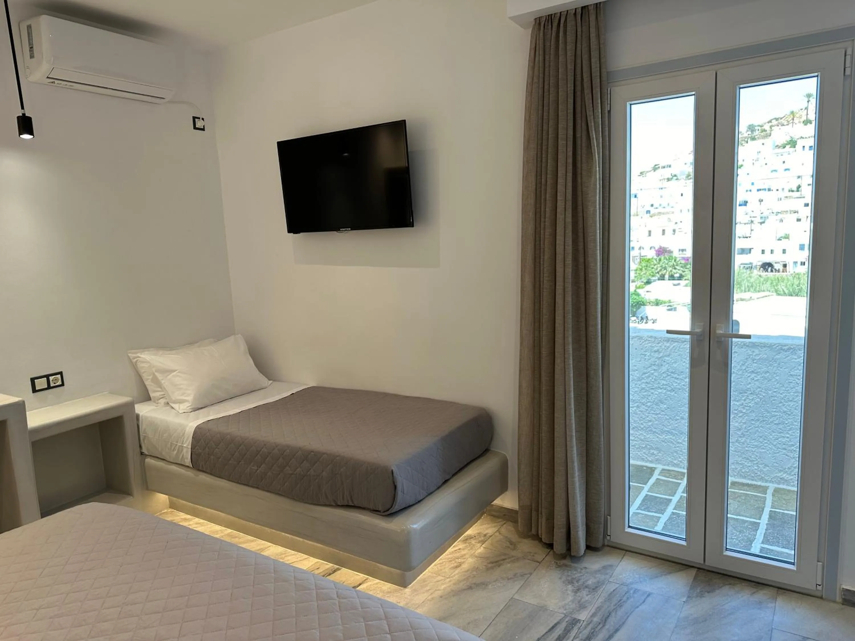 Bed in Aphrodite Hotel & Apartments