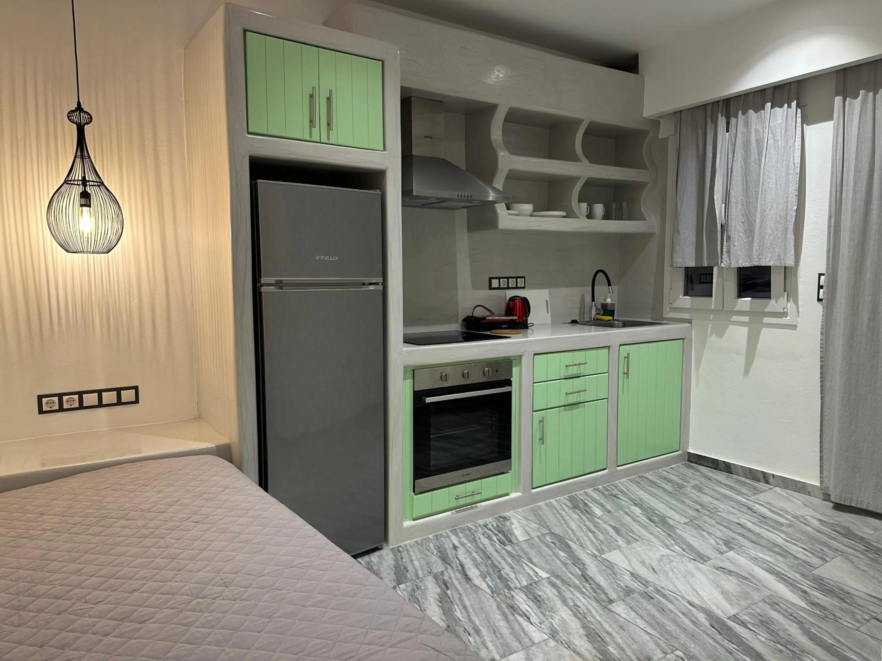 Kitchen or kitchenette in Aphrodite Hotel & Apartments