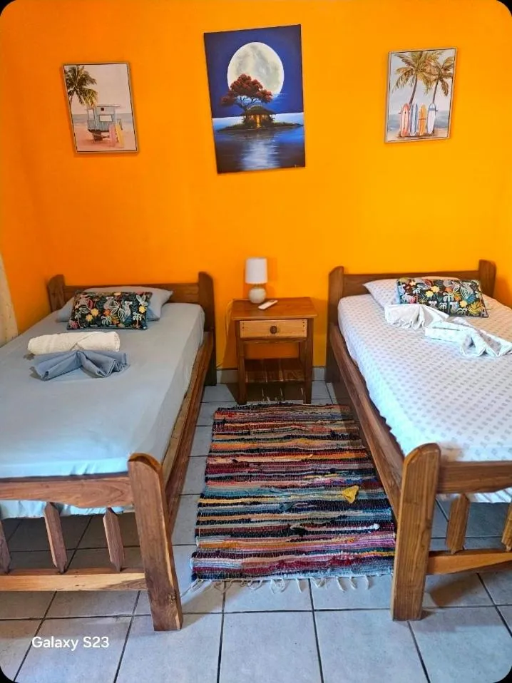 Bed in Playa San Diego Beachfront Rentals