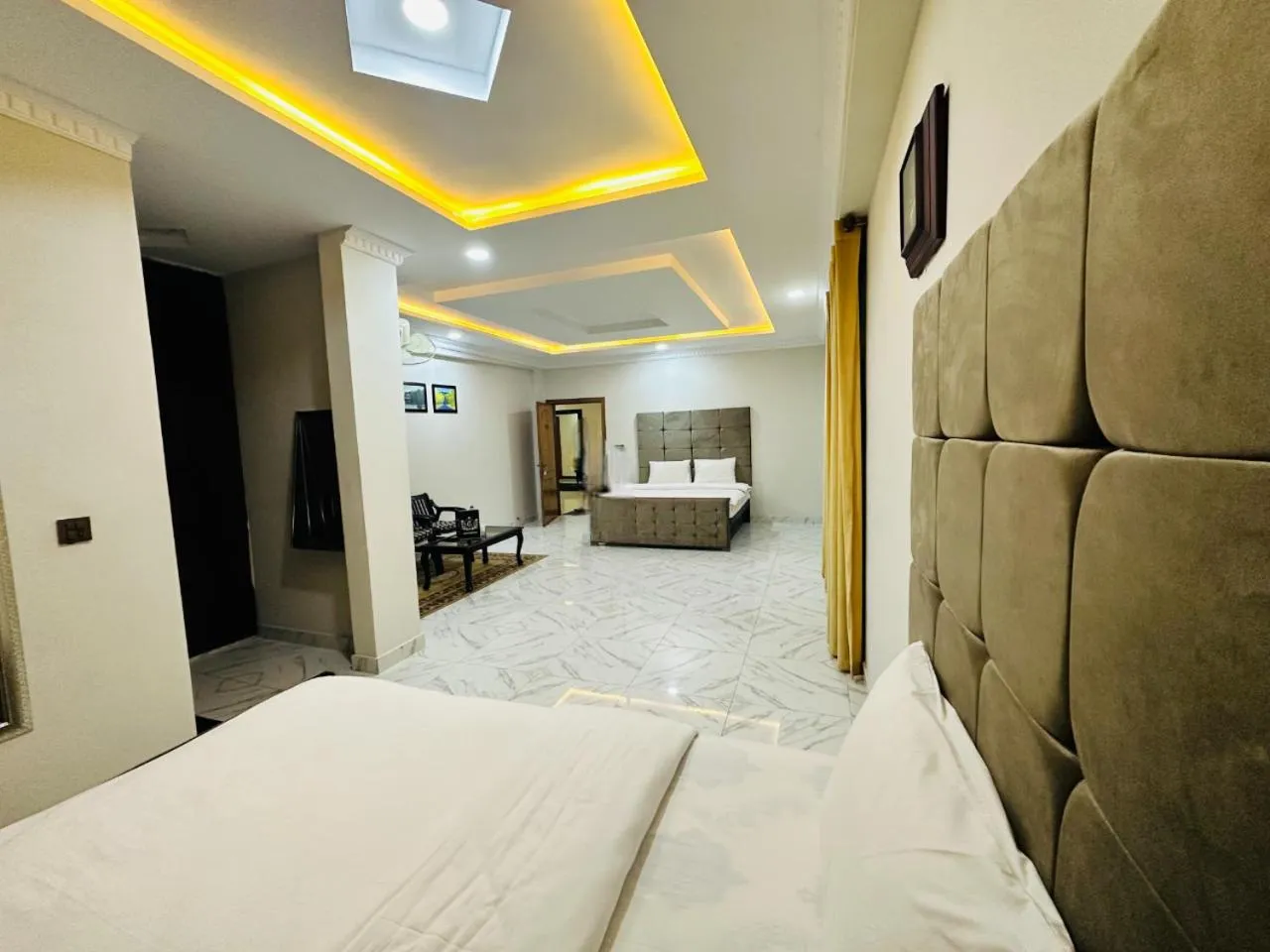 Photo of the whole room, Bed in Grand Taj