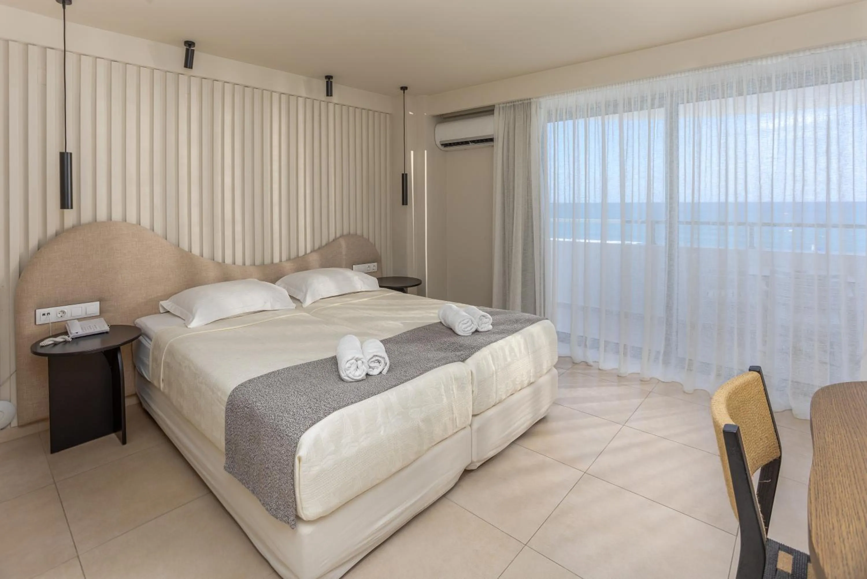Bed in Alia Beach Hotel by Estia