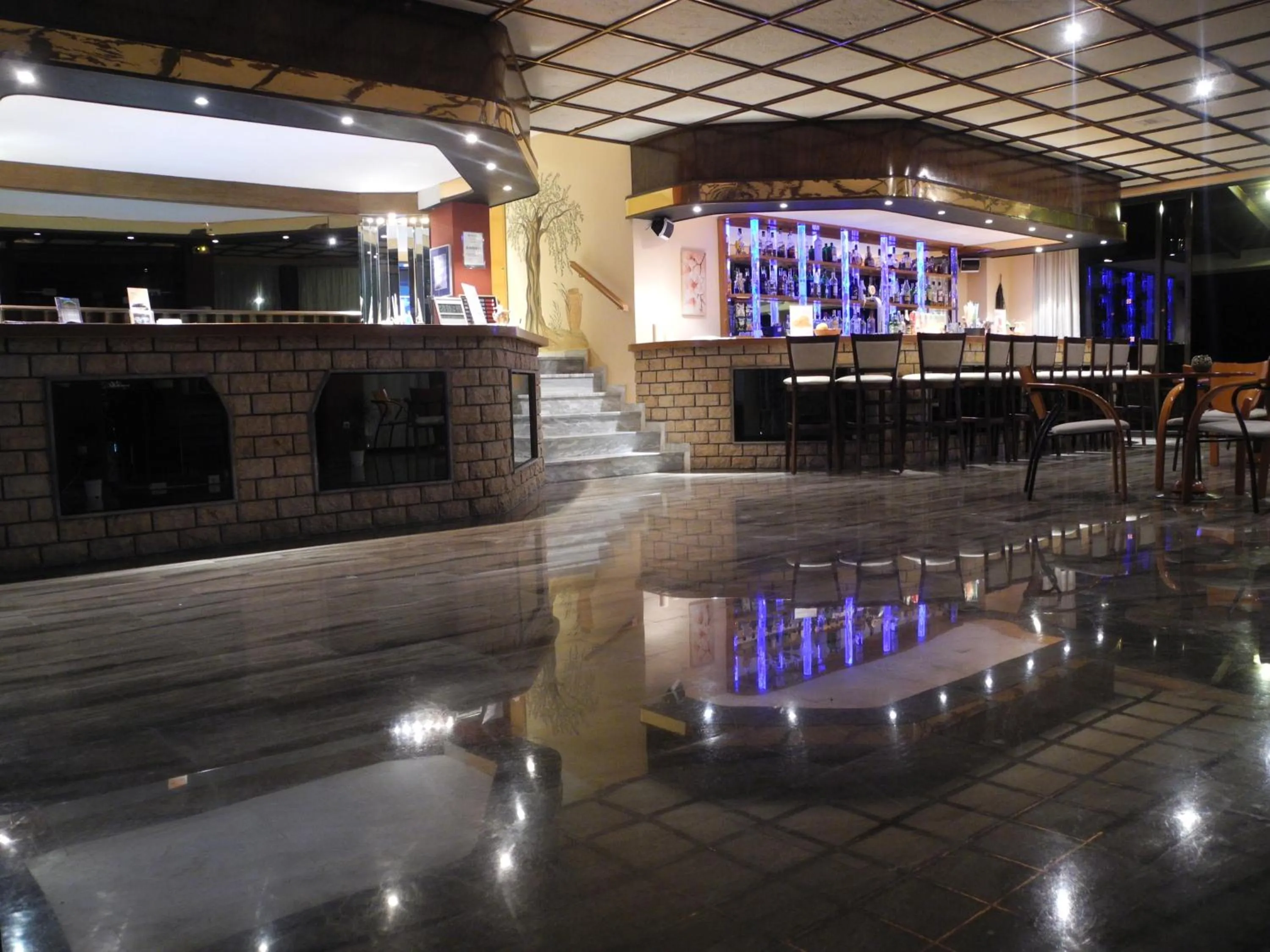 Communal lounge/ TV room in Pegasus Hotel