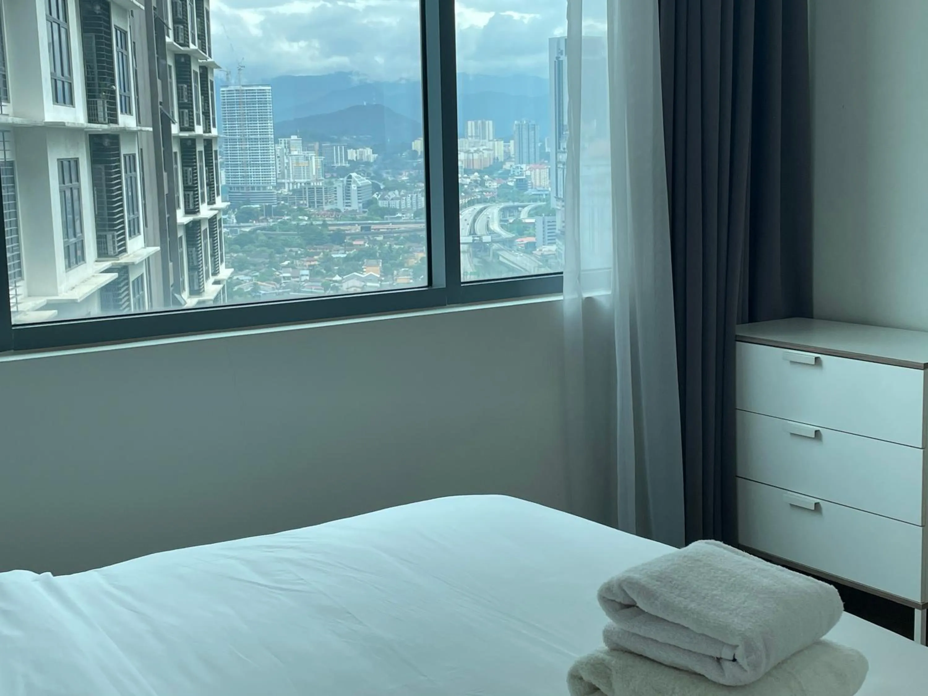 Bed in Mercu Summer Suite KLCC by Minshuku