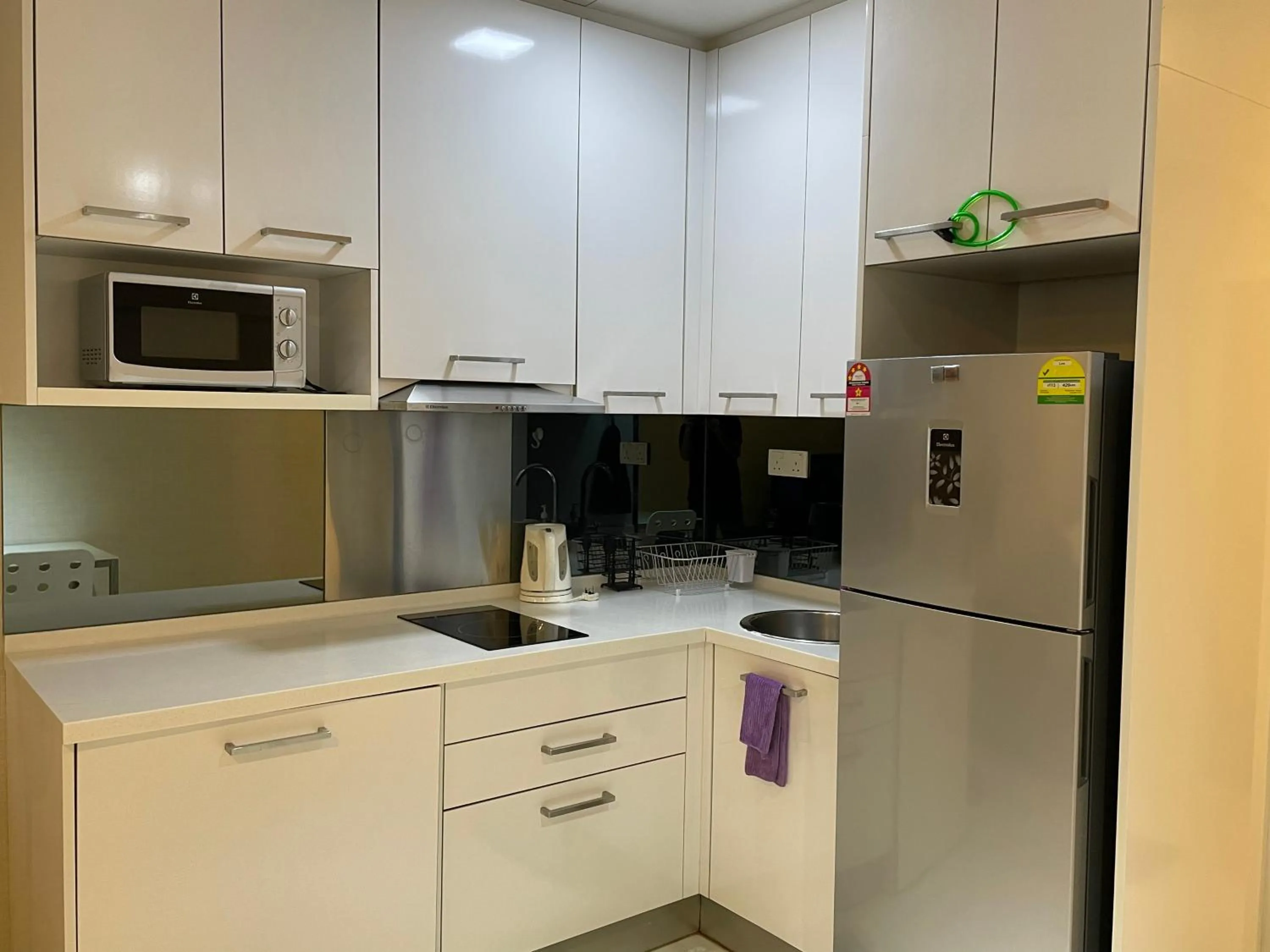 Kitchen or kitchenette in Mercu Summer Suite KLCC by Minshuku