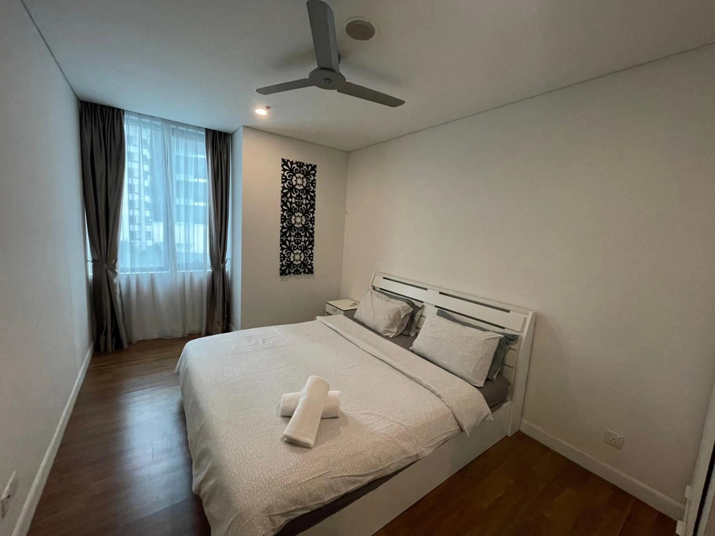 Bed in Mercu Summer Suite KLCC by Minshuku