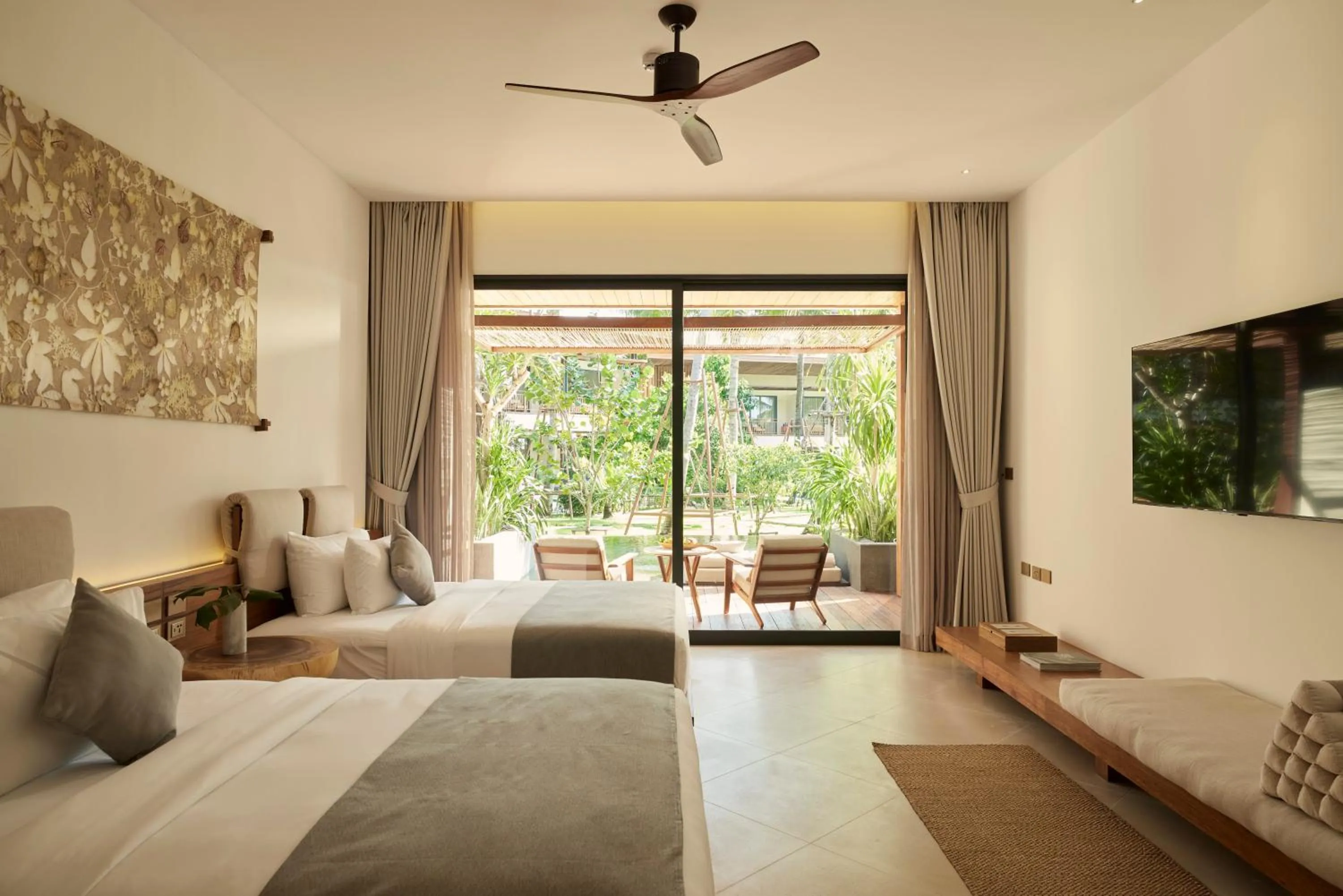 Bed in The Retreat Koh Chang, an SLH Hotel