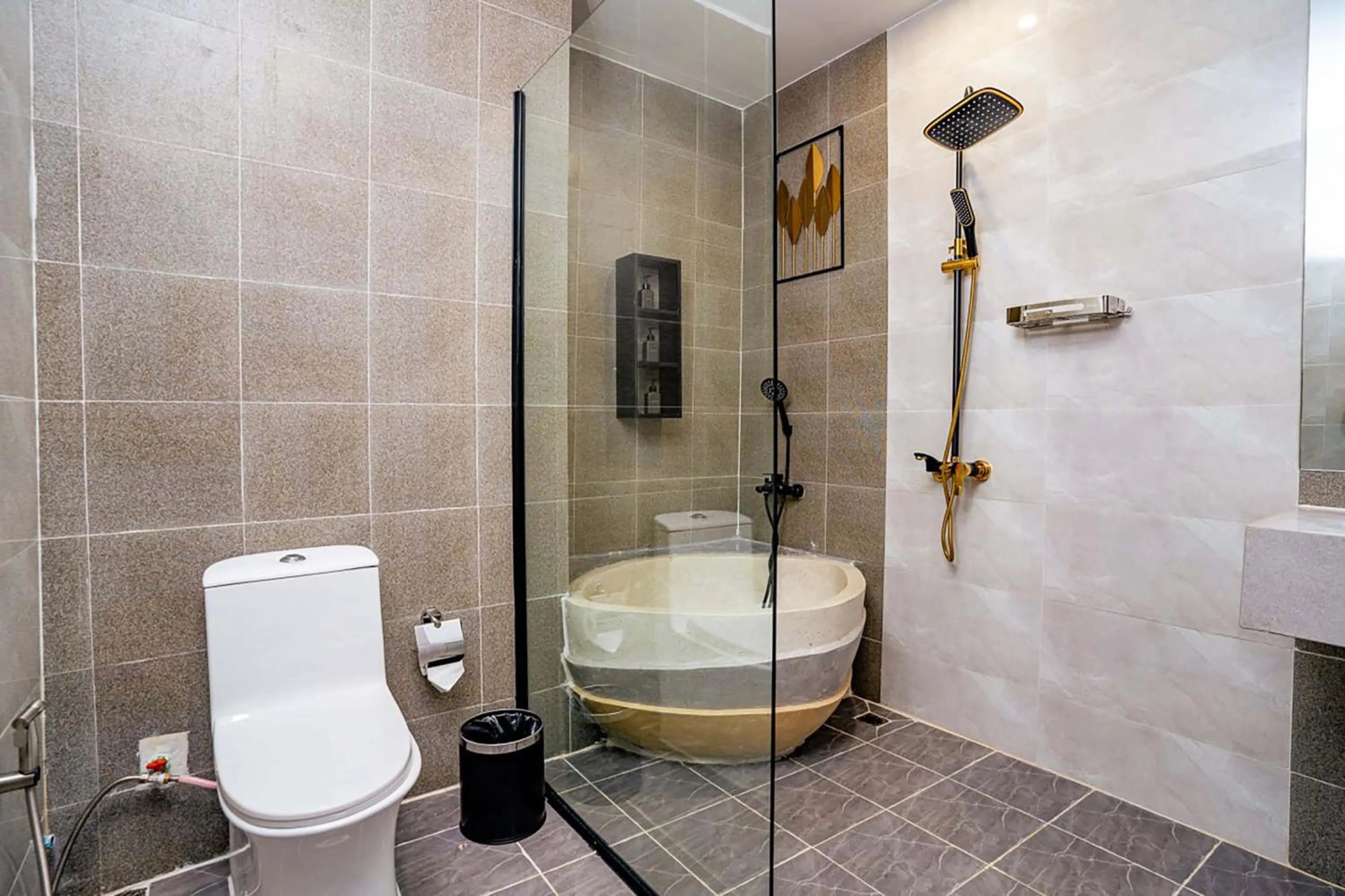 Bathroom in Rainforest Hotel by NSUN