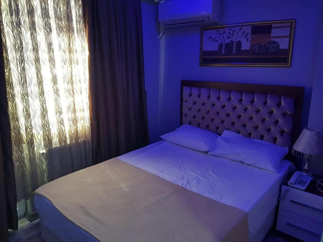 Bed in EYFEL HOTEL