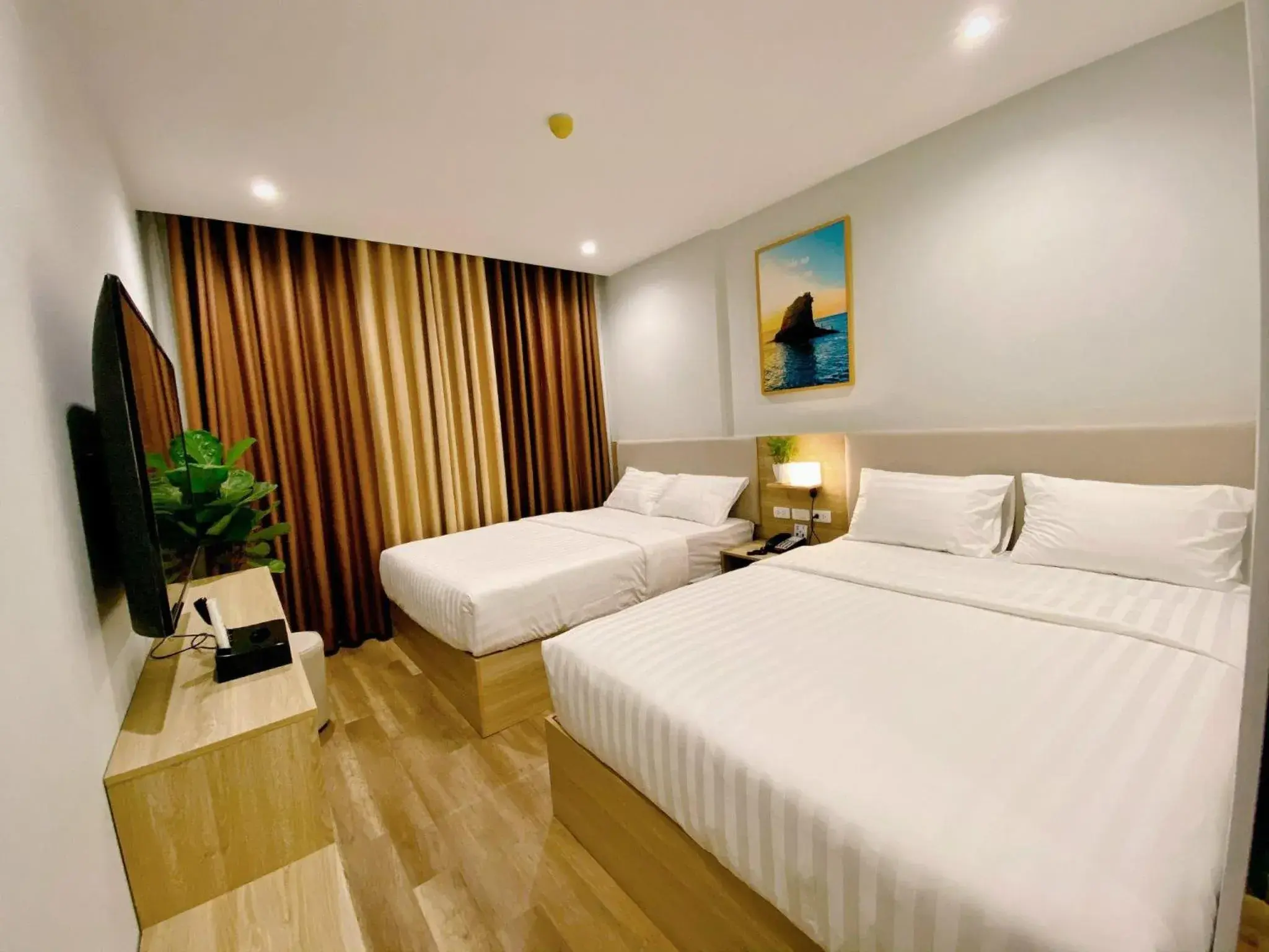 Deluxe Quadruple Room in Vu Gia Hotel Phu Quoc Deluxe Quadruple Room in Vu Gia Hotel Phu Quoc