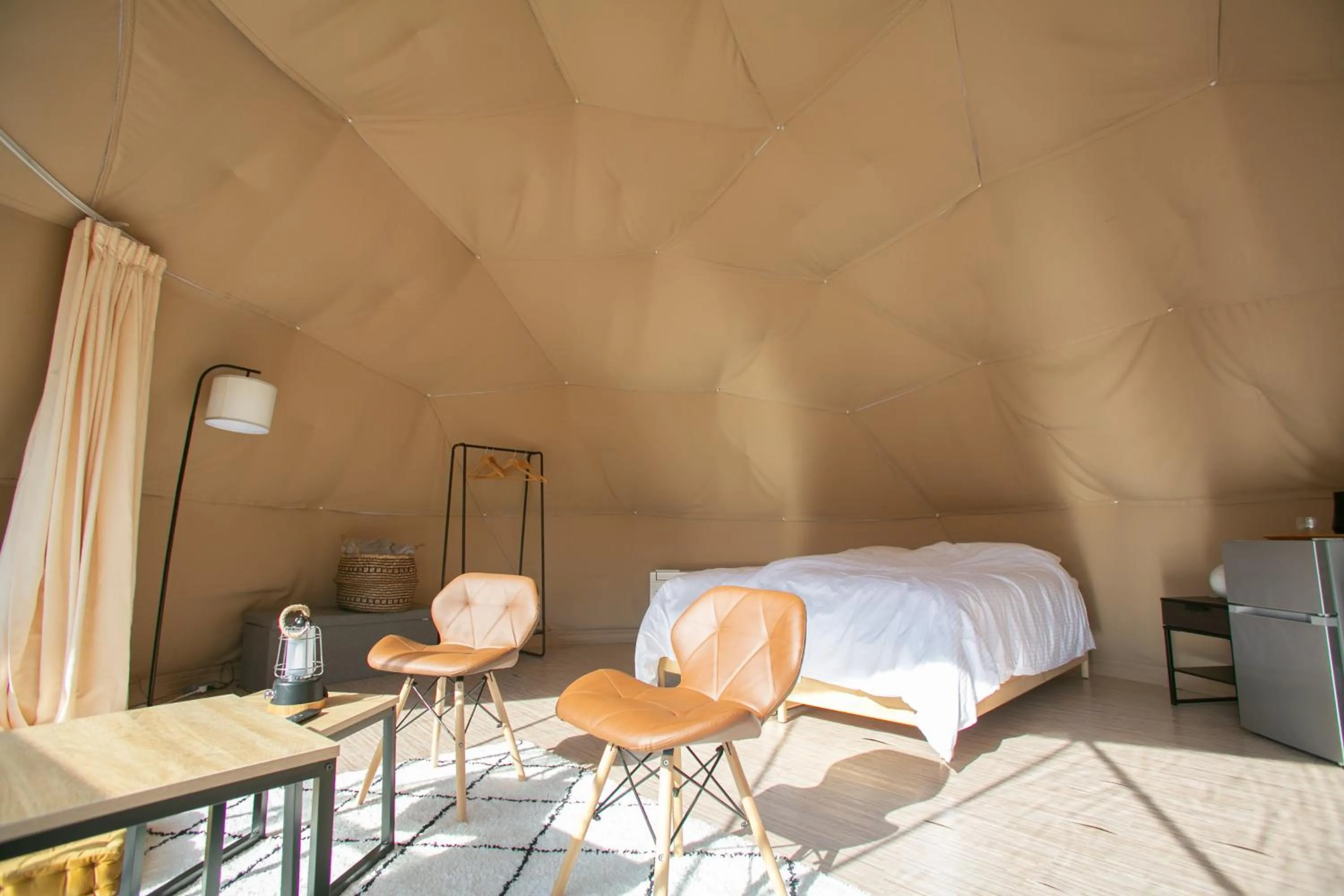 Bed in glampark Keburikawa Kyoto