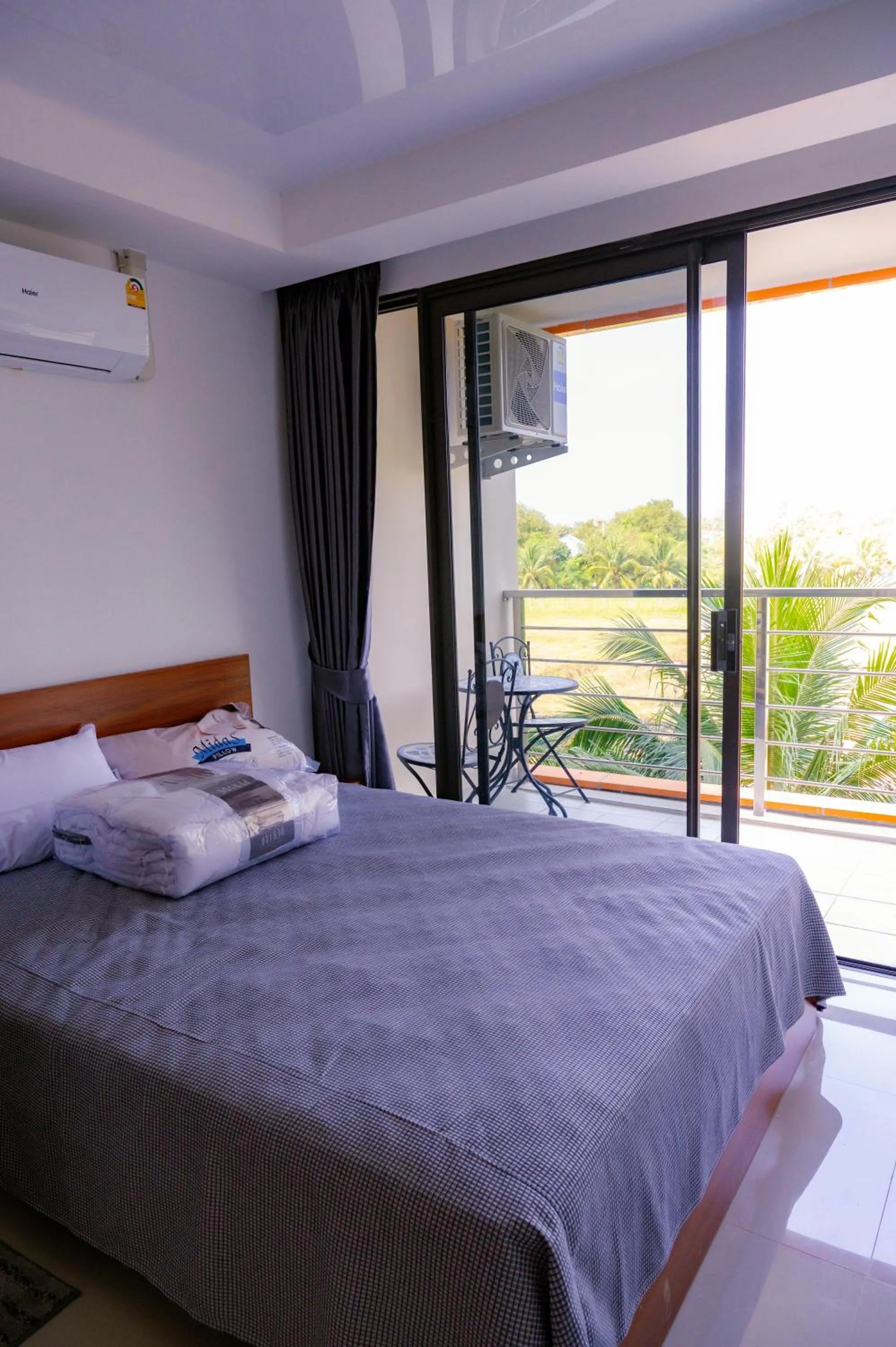 Bed in 777 Beach Condo Phuket