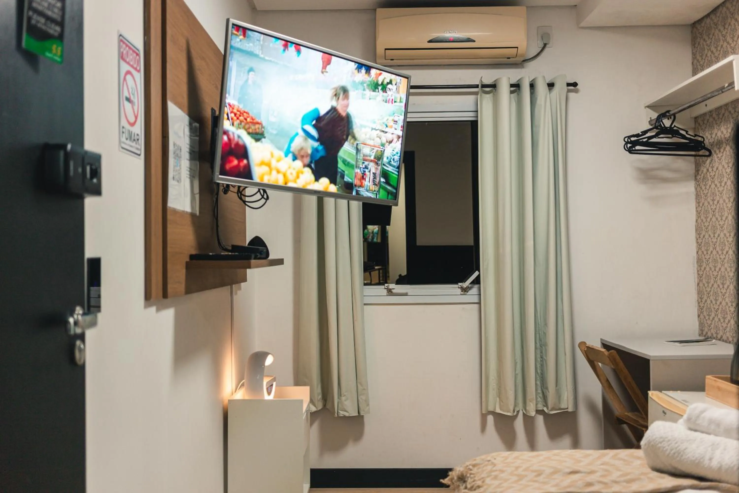 Bed in 55 Smart Hotel