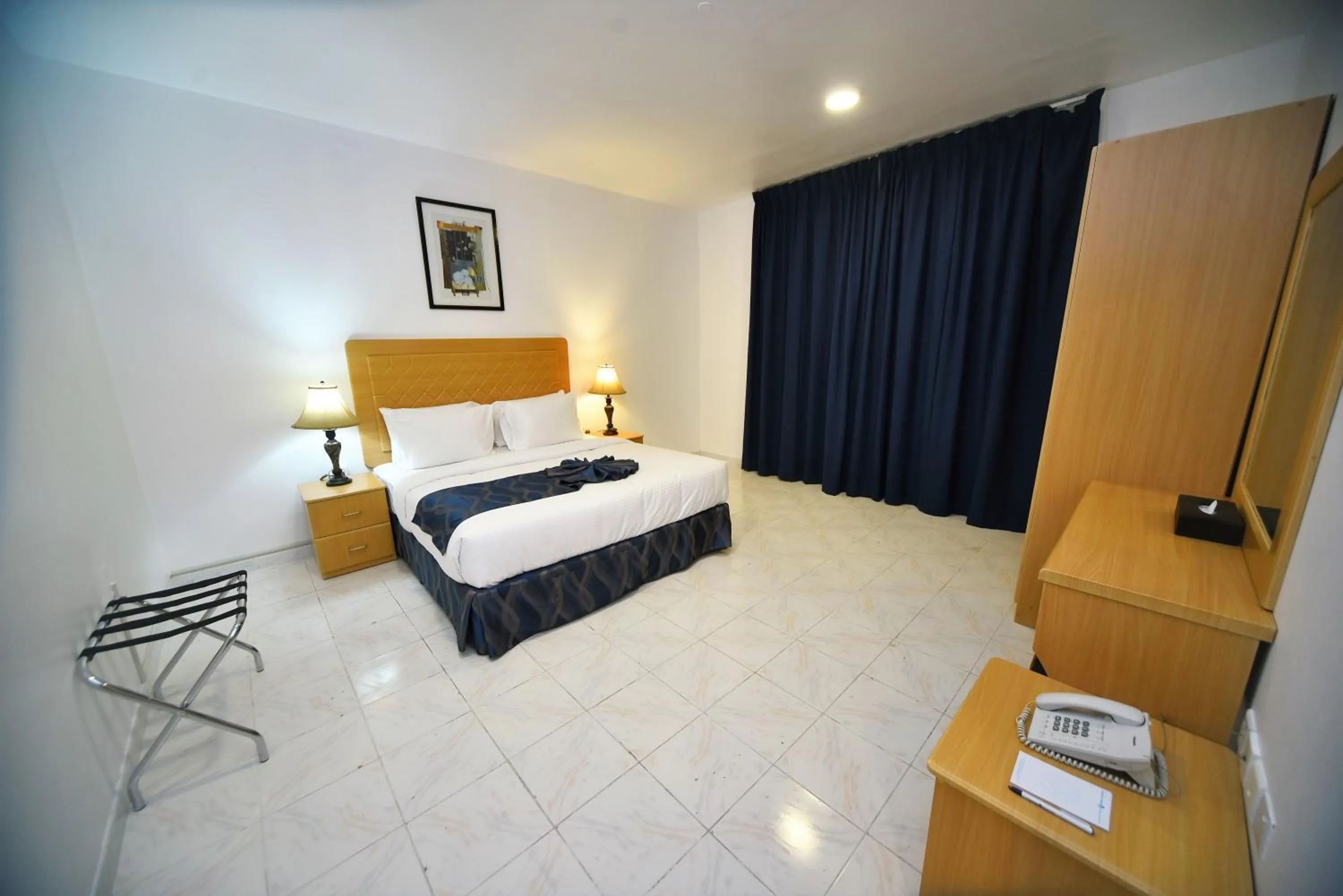 Bed in Alain Hotel Apartments Ajman