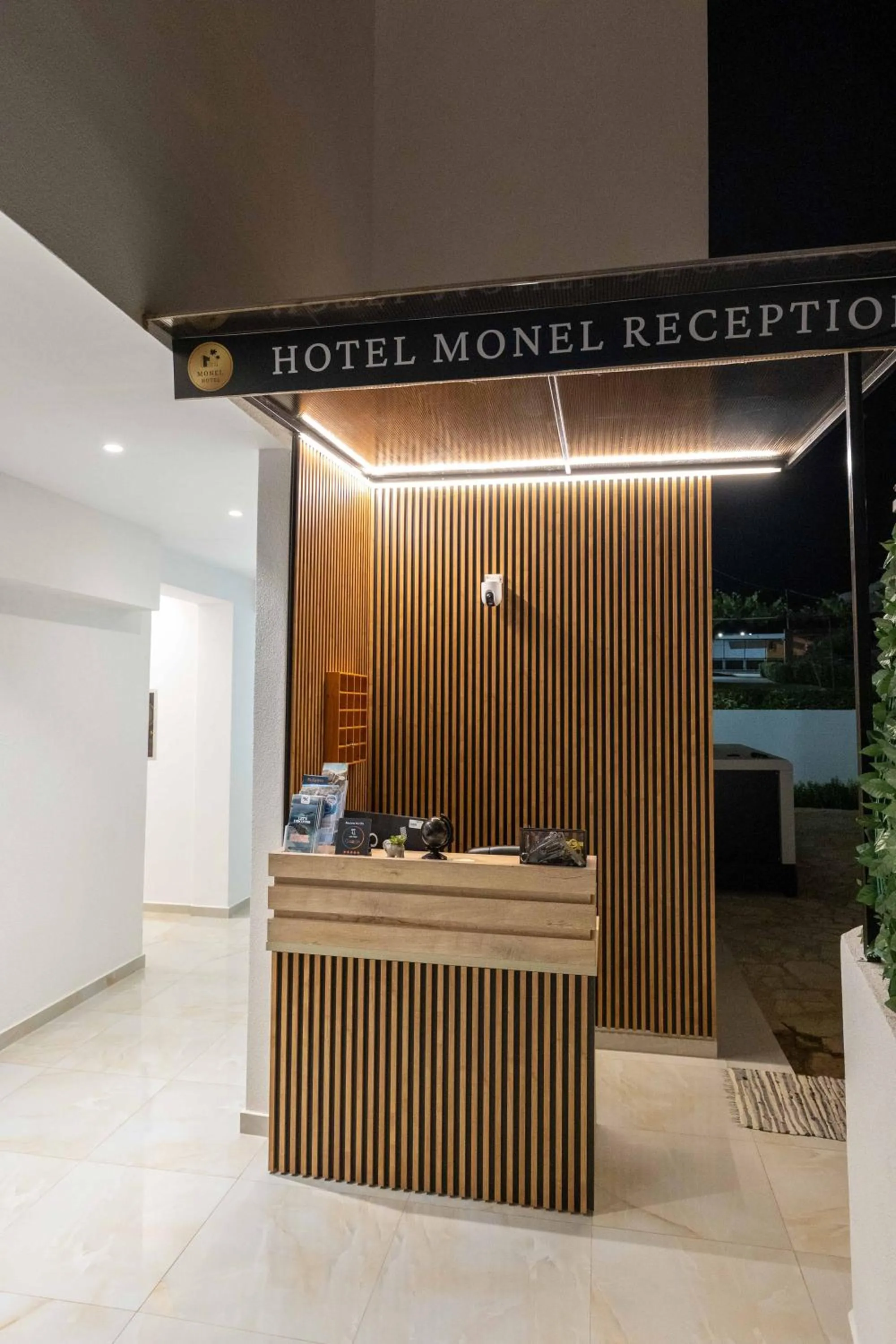 Lobby or reception in Monel Hotel