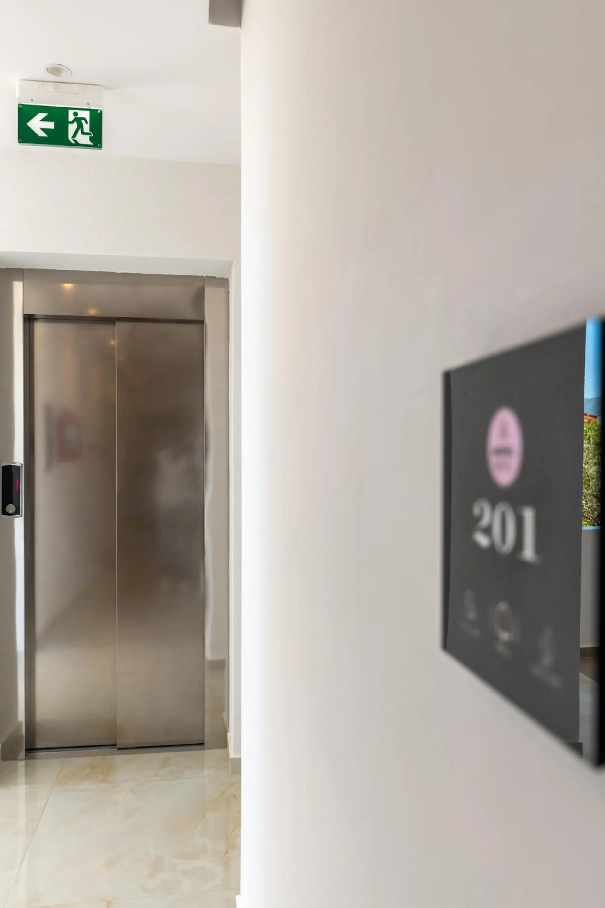 Property logo or sign in Monel Hotel