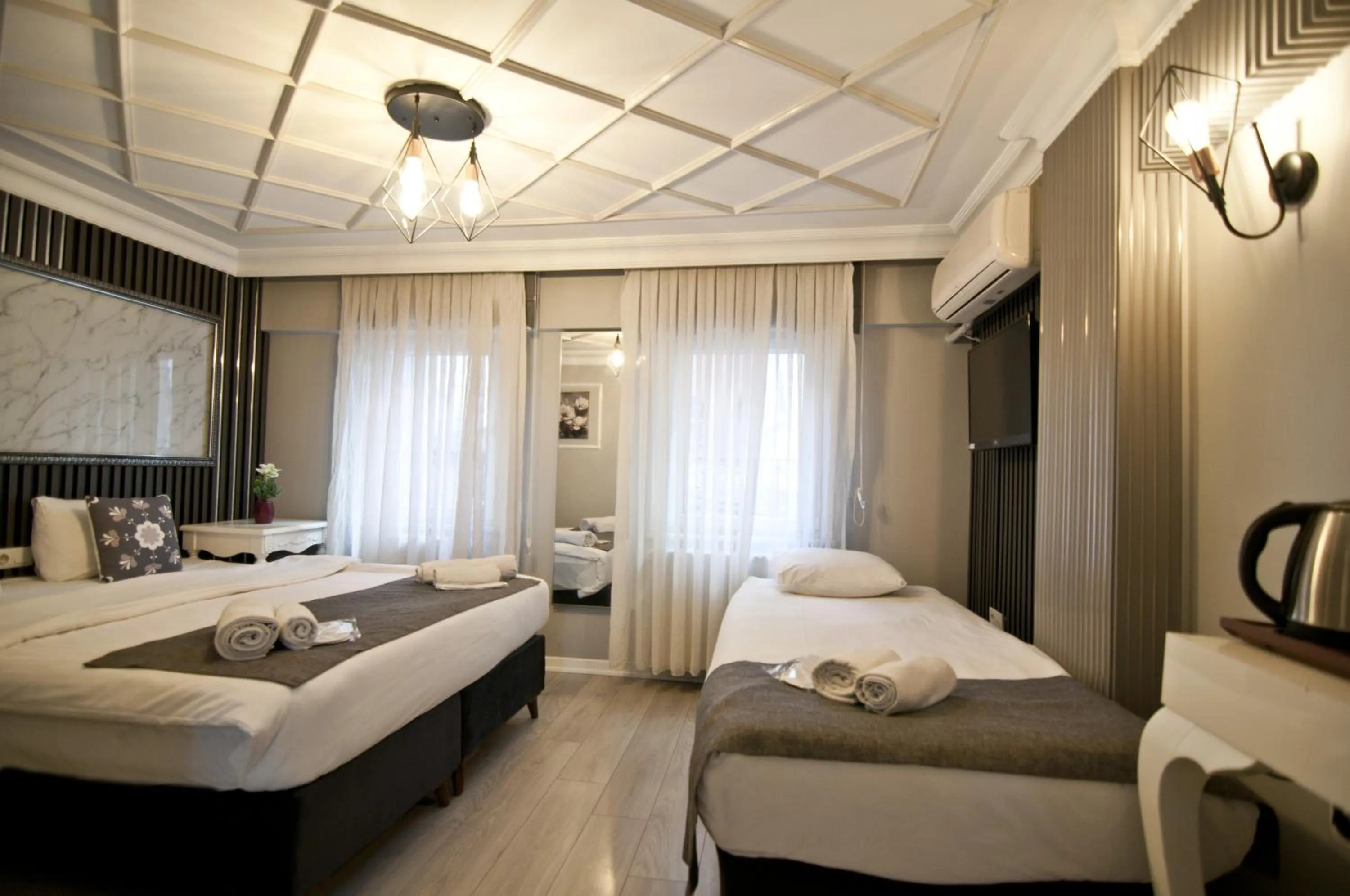 Bed in Nova City Hotel