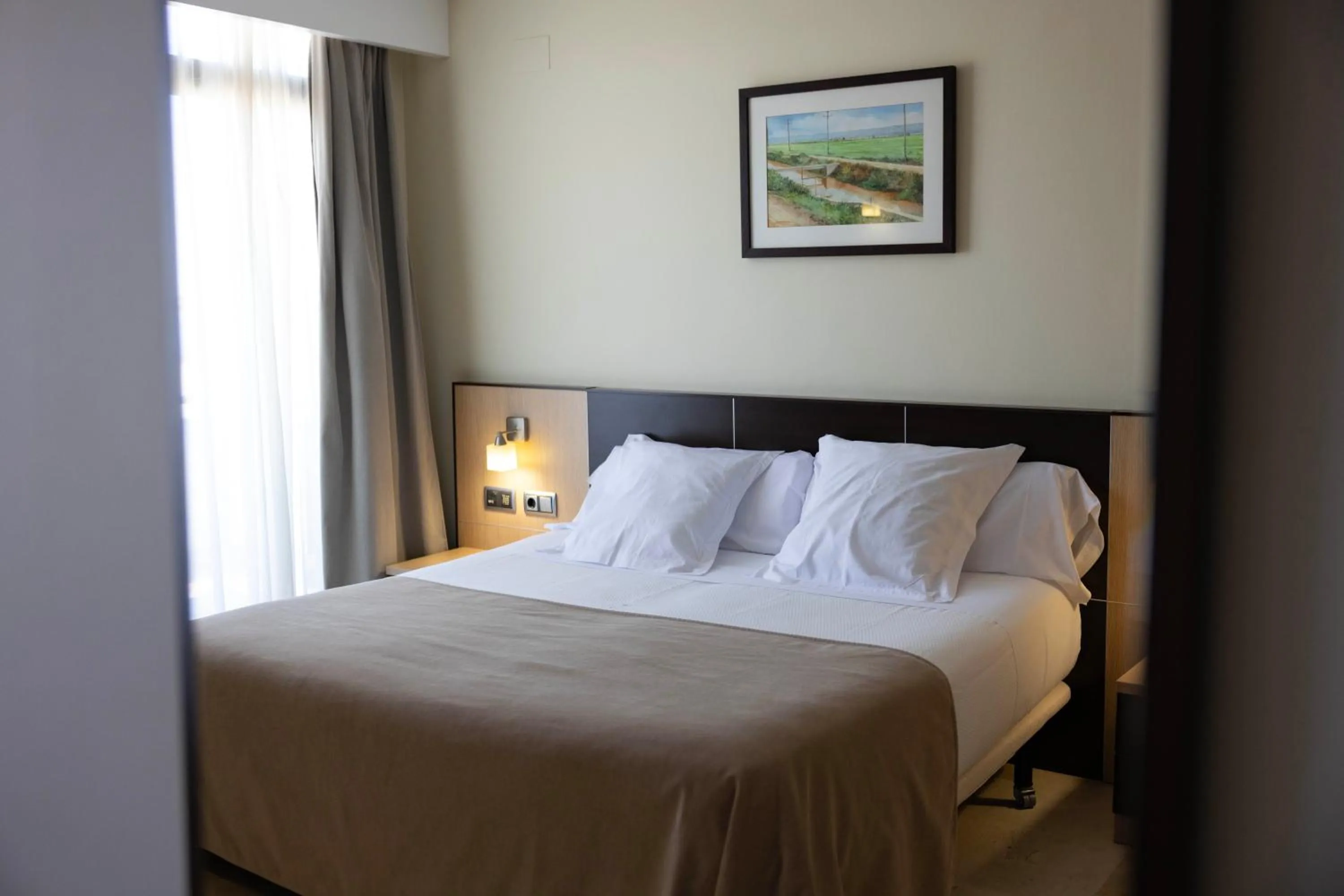 Bed in Hotel Flamingo