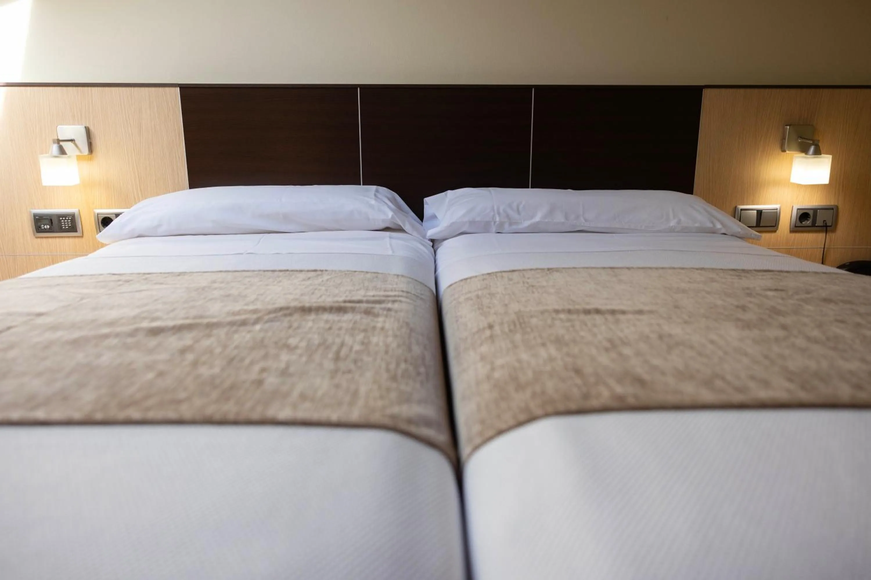 Bed in Hotel Flamingo