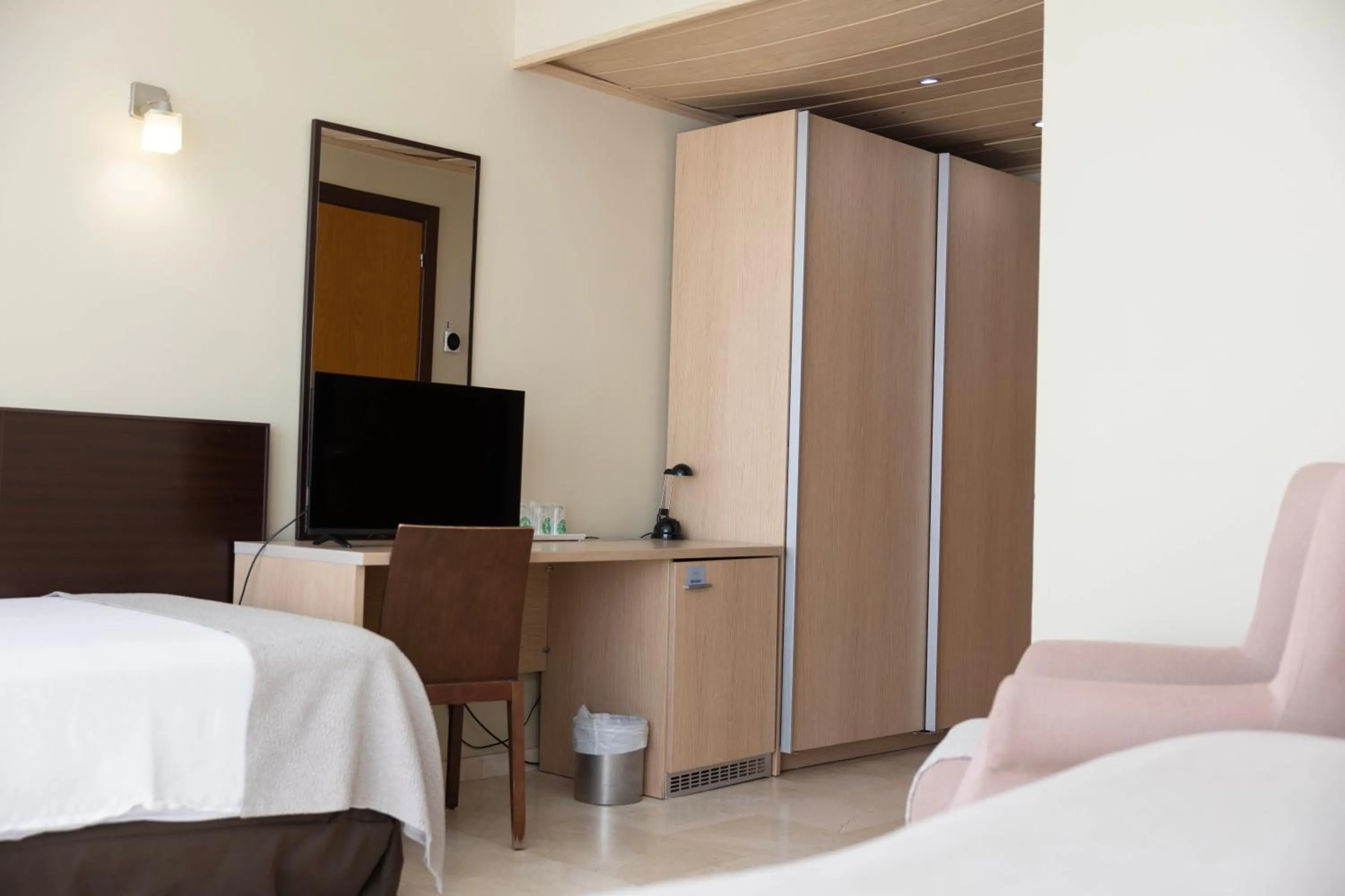 Bed in Hotel Flamingo