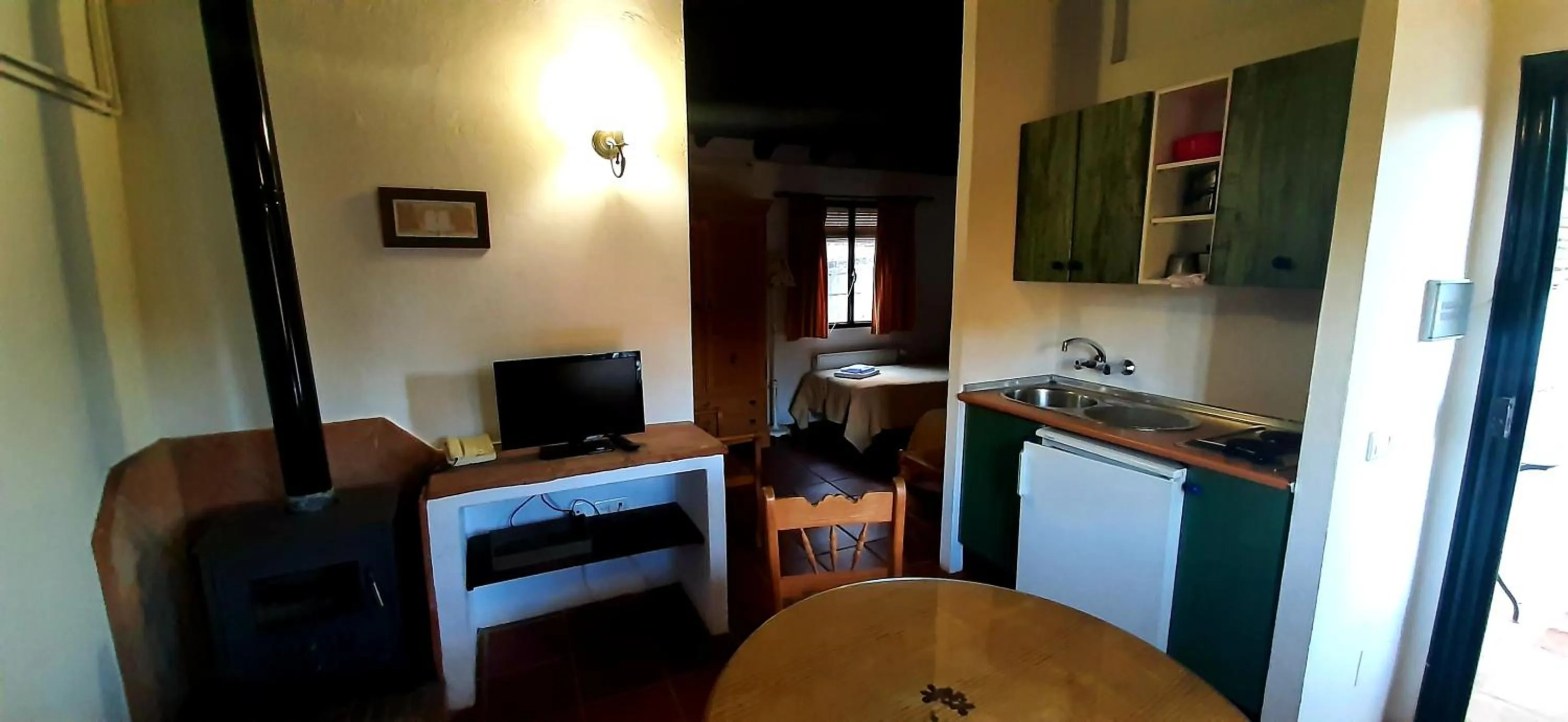 Kitchen or kitchenette in Finca Valbono Apartamentos Rurales y Hotel