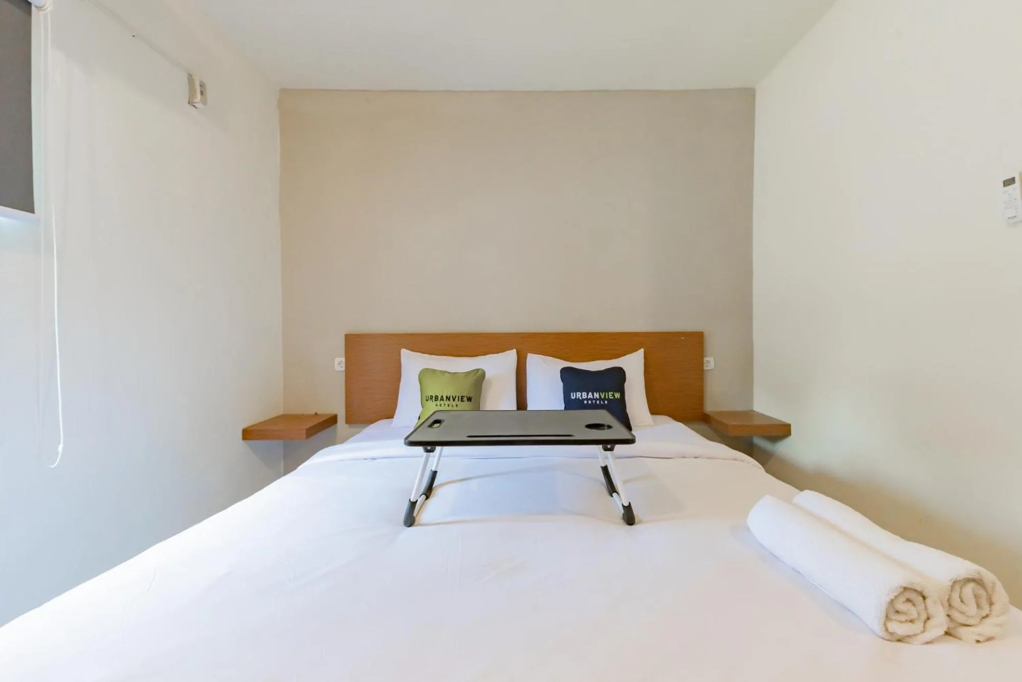 Bed in Urbanview Hotel Diamond Malai Permata near Universitas Palangkaraya