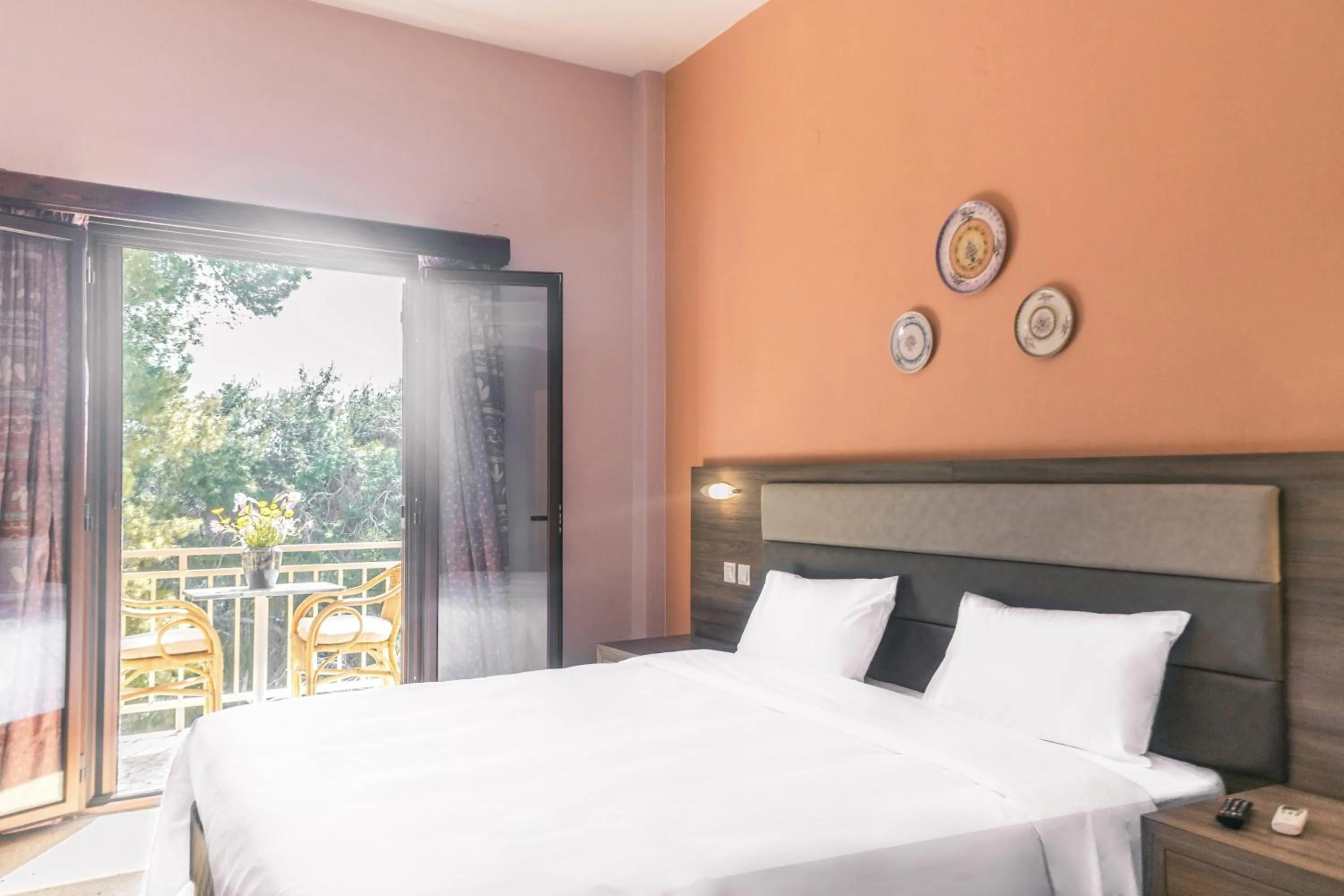 Bed in The Delfini Hotel