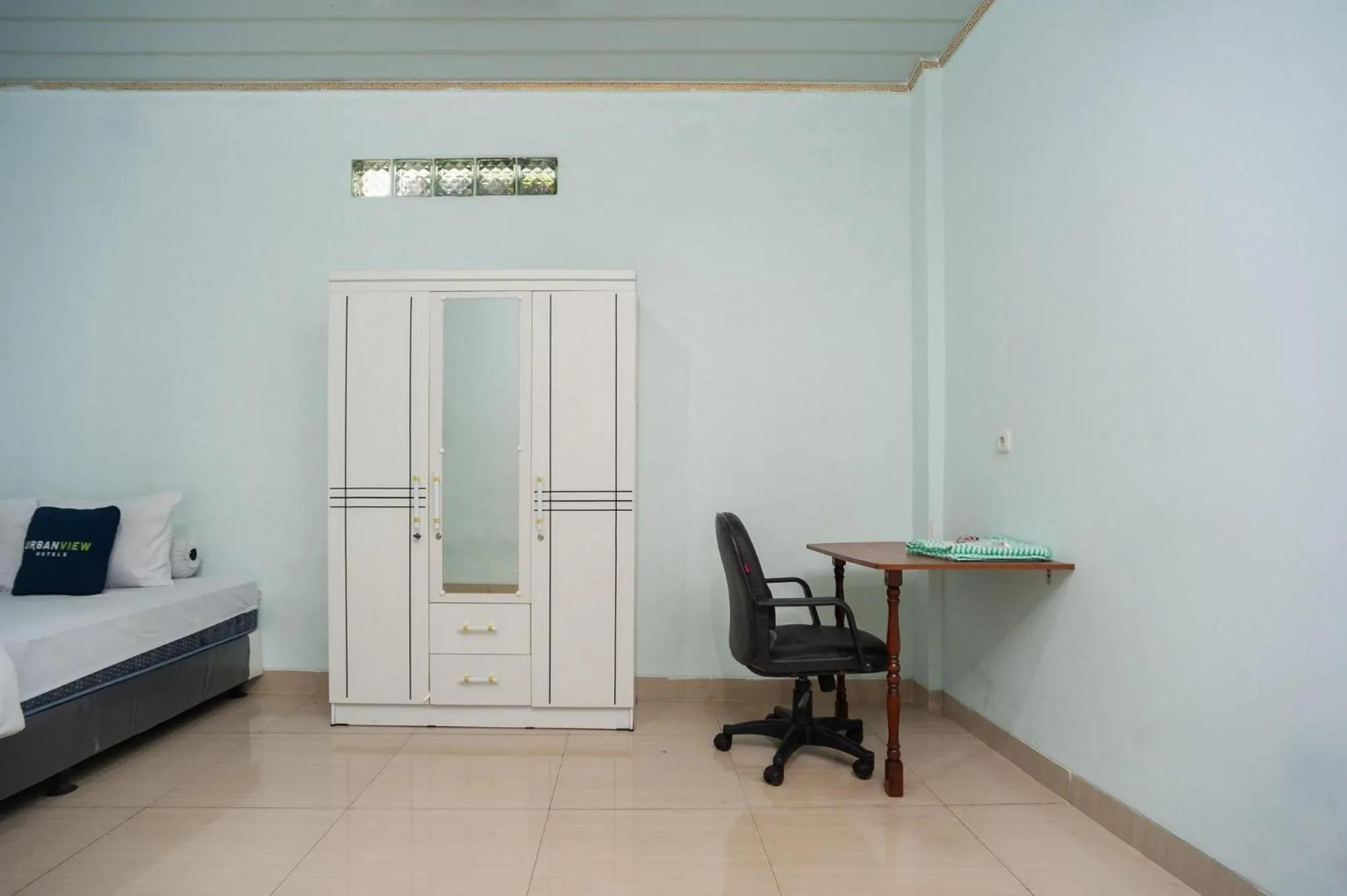 Bedroom in Urbanview My Home Ciracas by RedDoorz