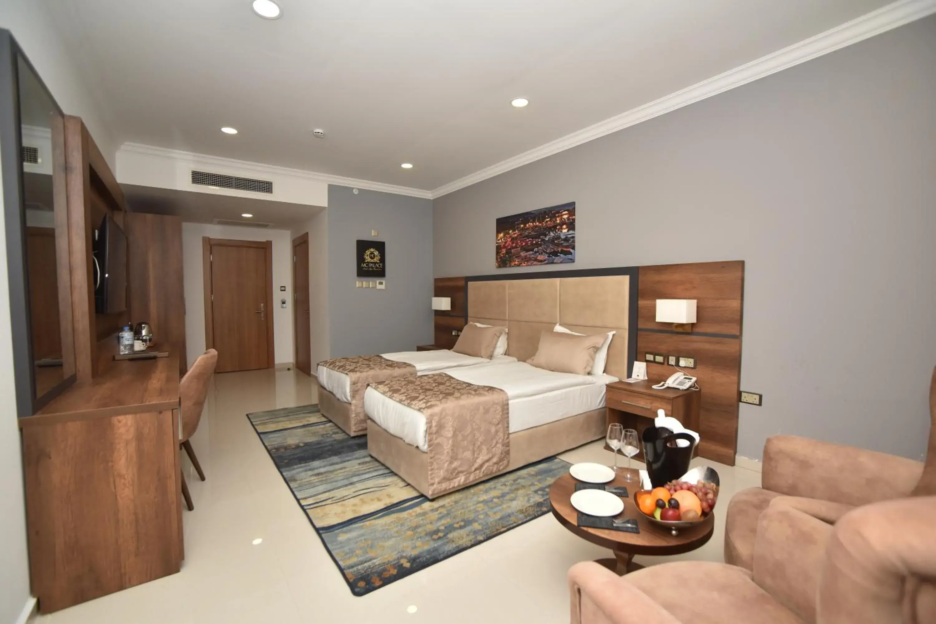 Economy Quadruple Room in Mc Palace Hotel Spa & Convention Economy Quadruple Room in Mc Palace Hotel Spa & Convention