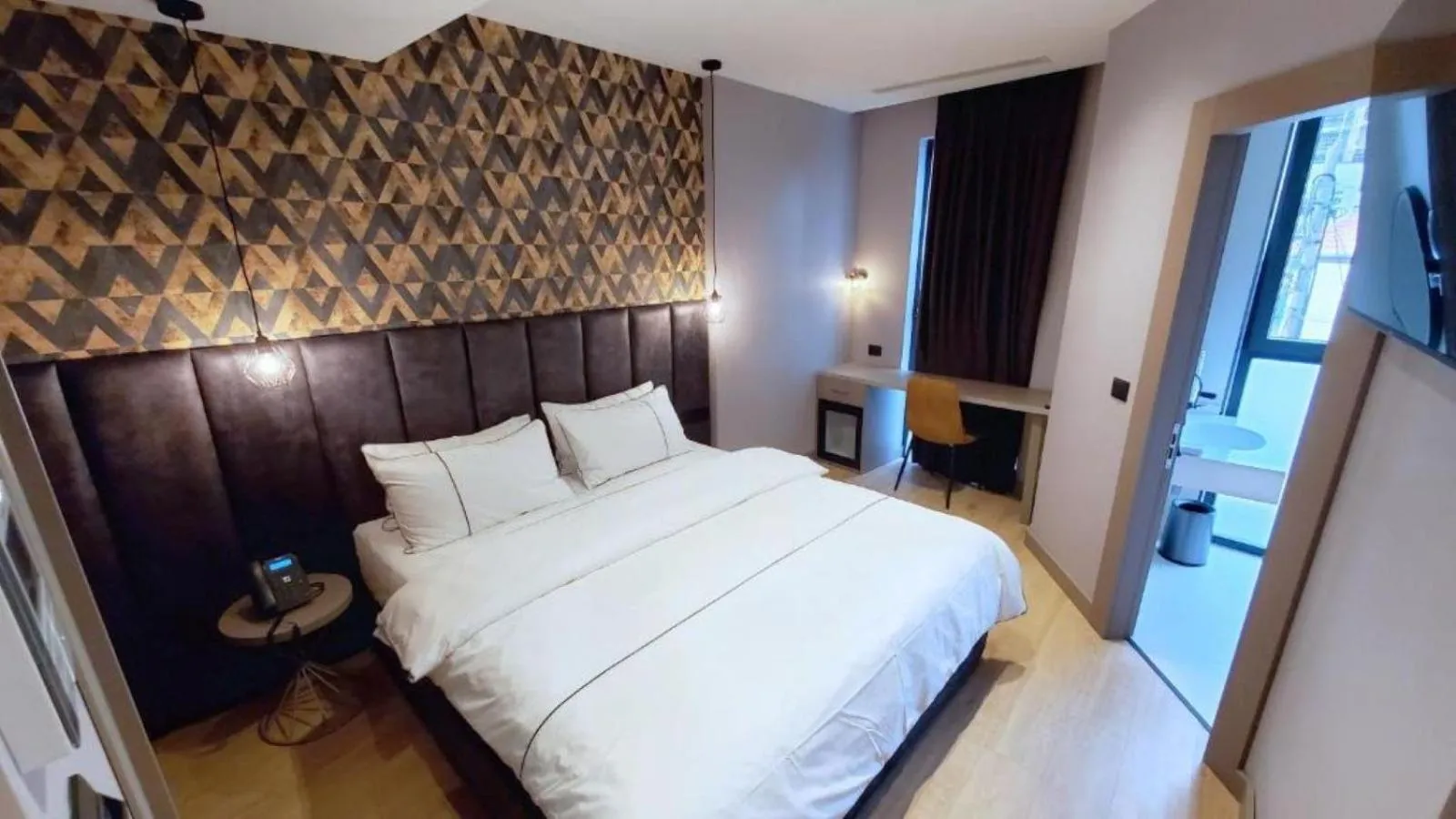 Bed in StarLight Hotel