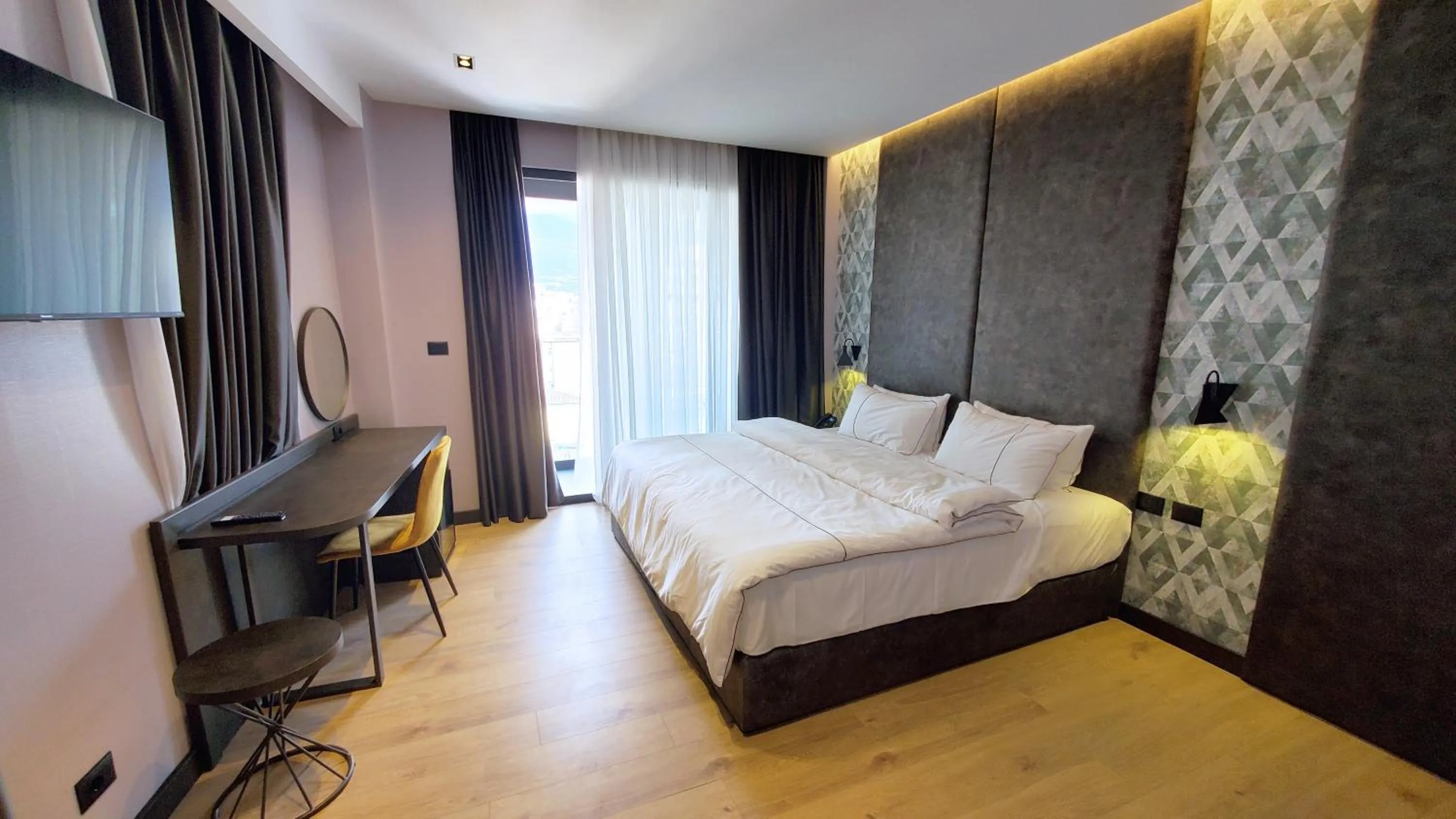 Bed in StarLight Hotel