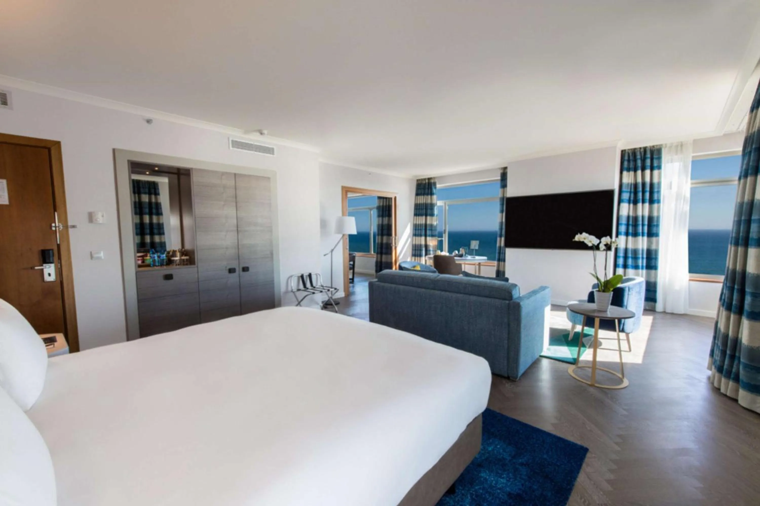 Living room, Bed in Hilton Diagonal Mar Barcelona