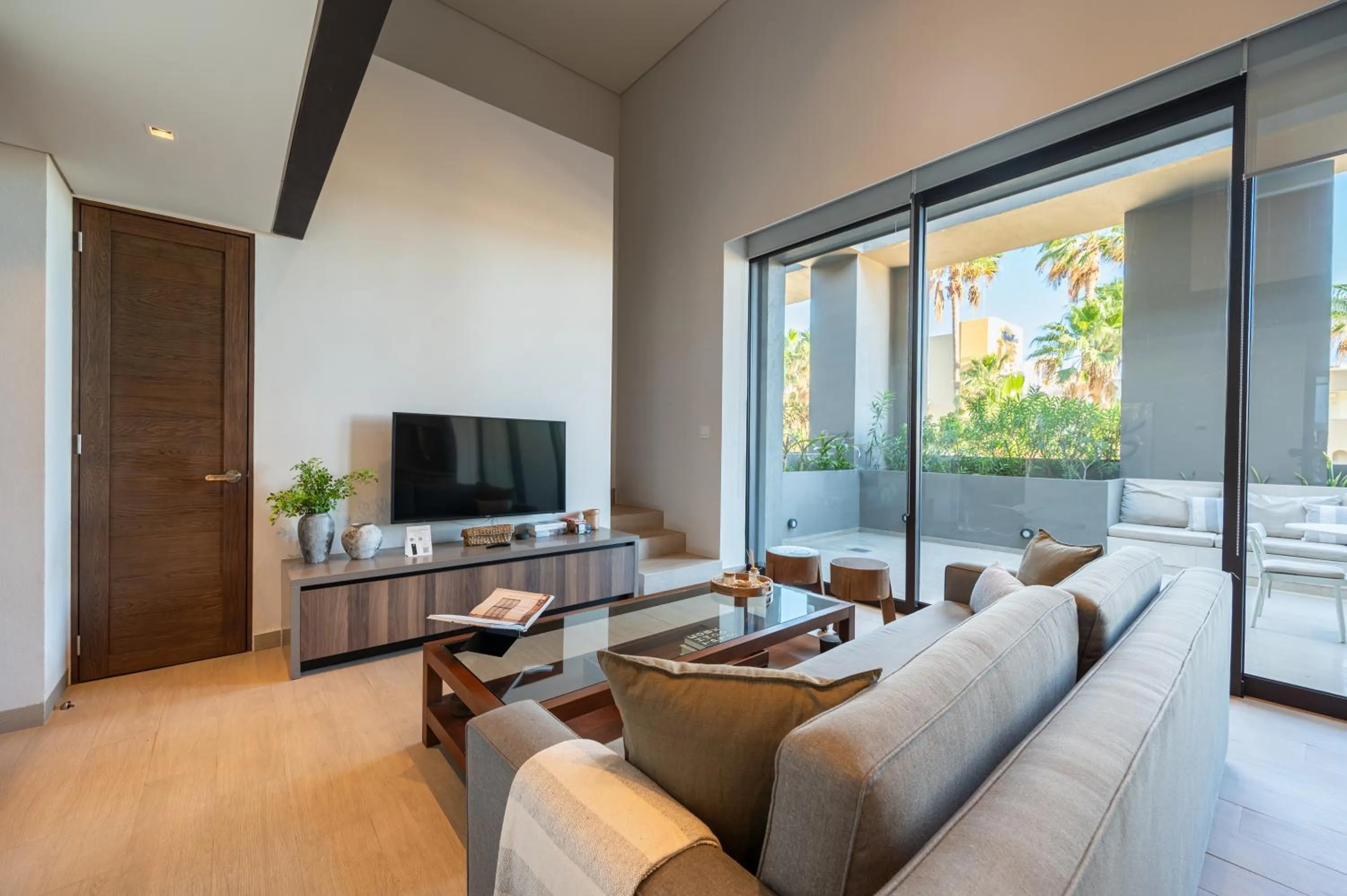 Living room in Paraiso Residences Marina Cabo by Capitalia