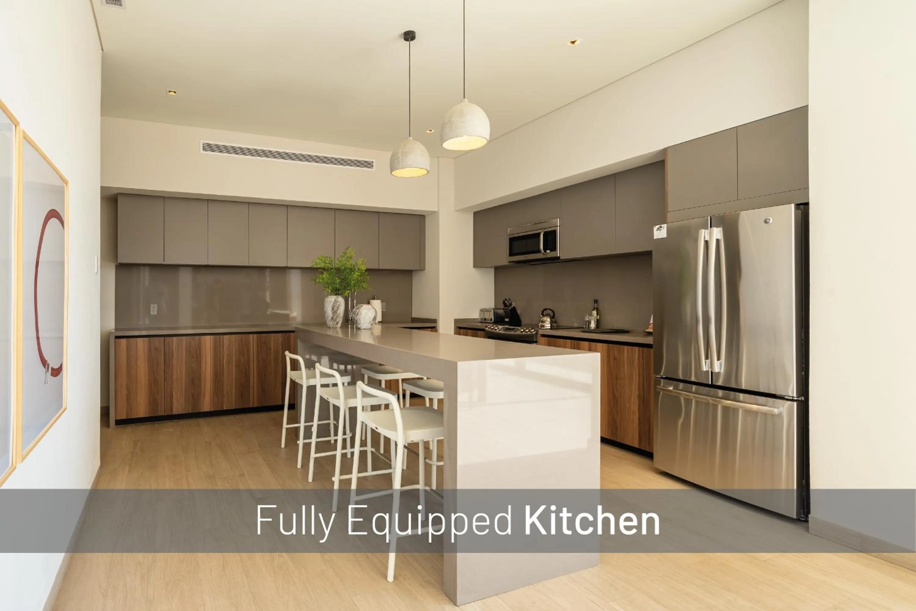 Kitchen or kitchenette in Paraiso Residences Marina Cabo by Capitalia