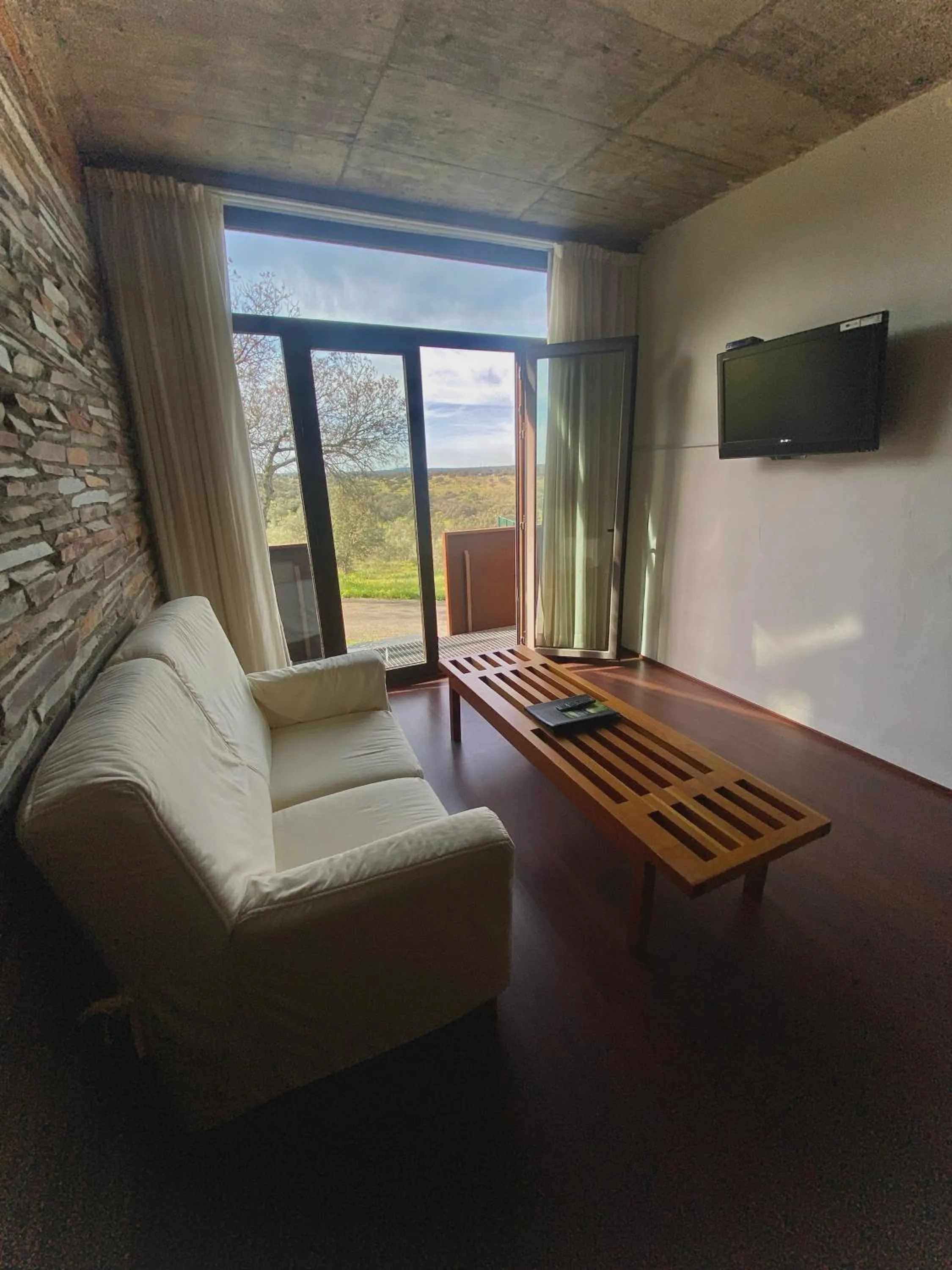 Living room in Hotel Parque de Monfragüe