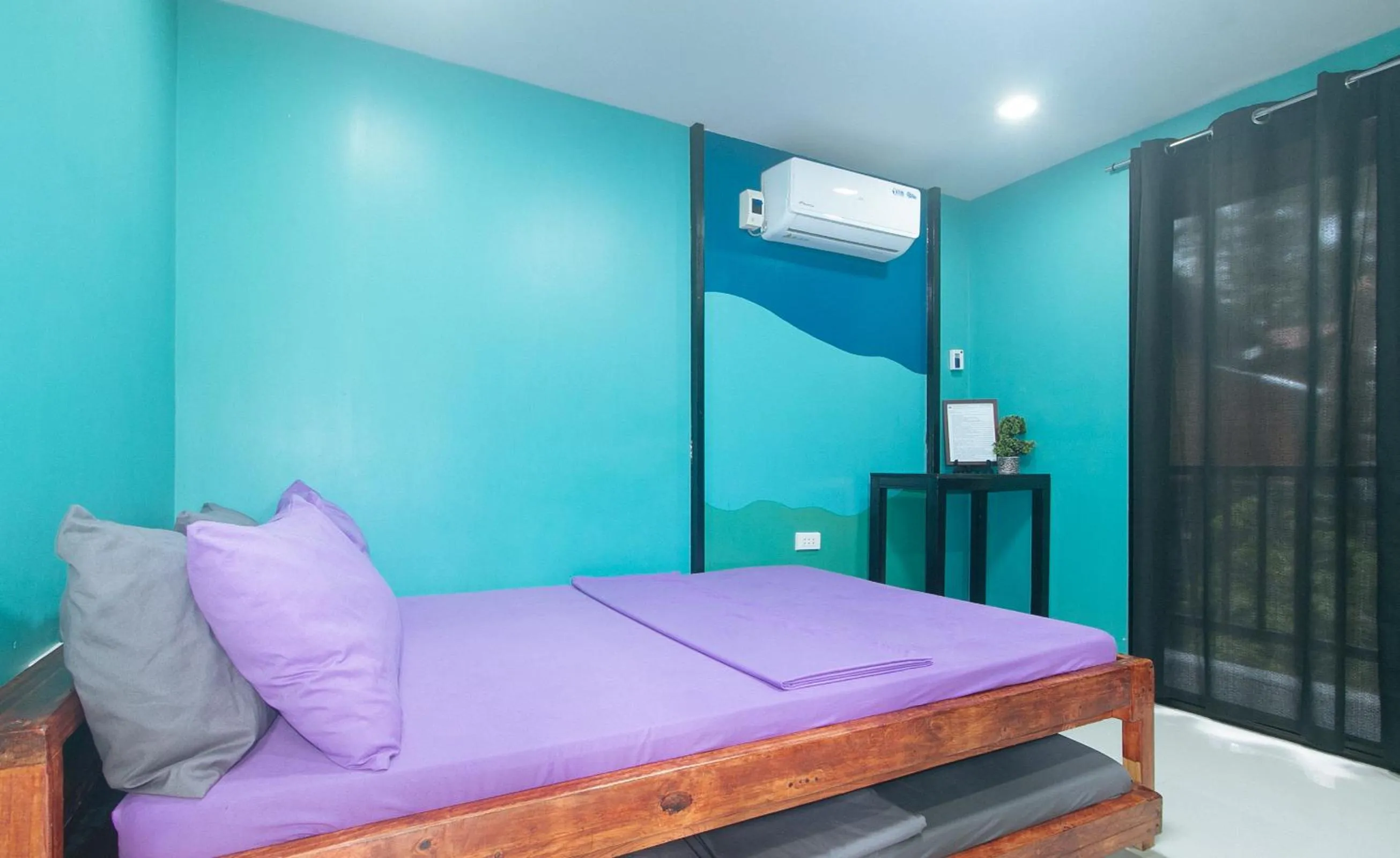 Photo of the whole room, Bed in RedDoorz @ Dolce Cabanas Beach Resort