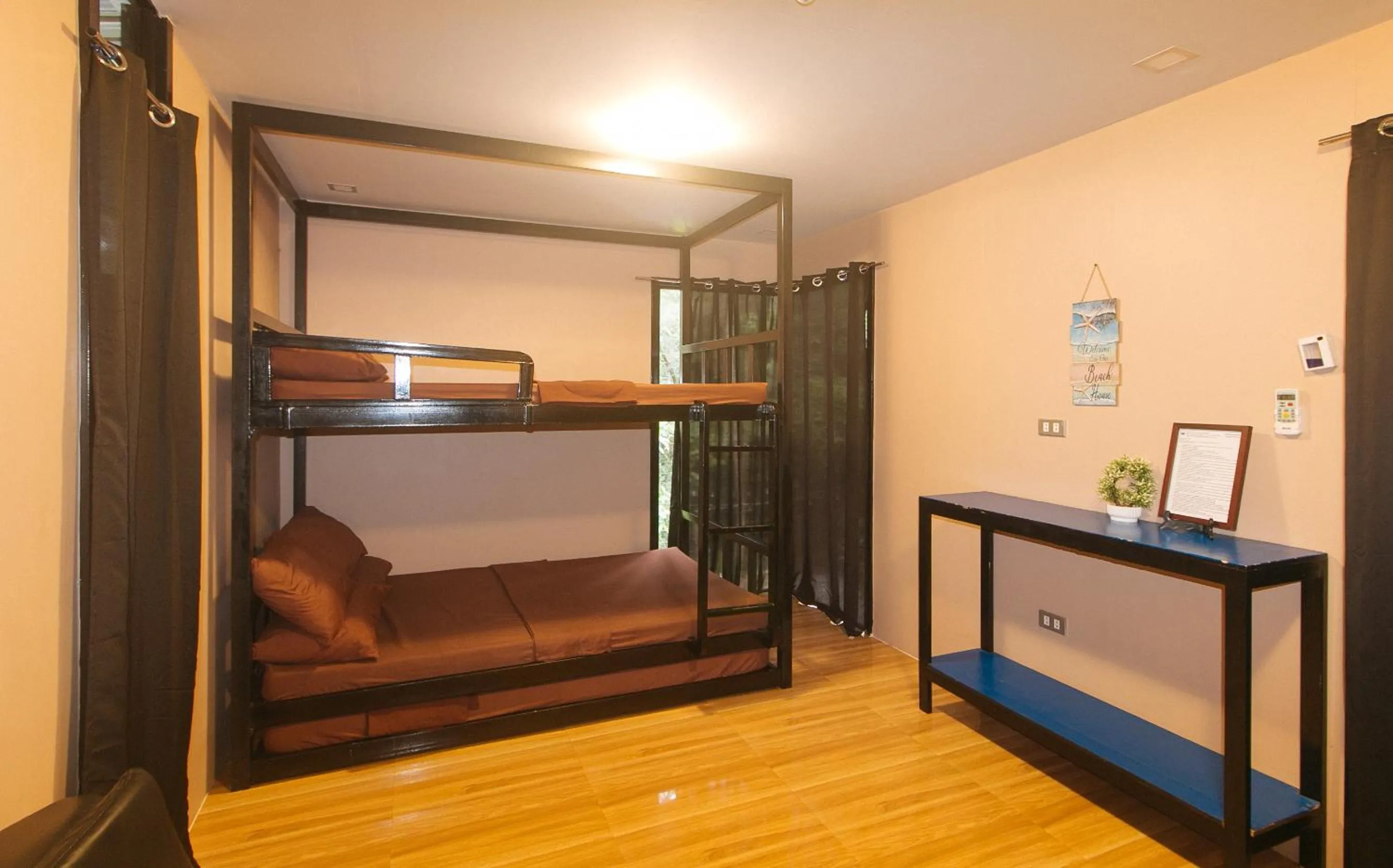 Photo of the whole room, Bed in RedDoorz @ Dolce Cabanas Beach Resort