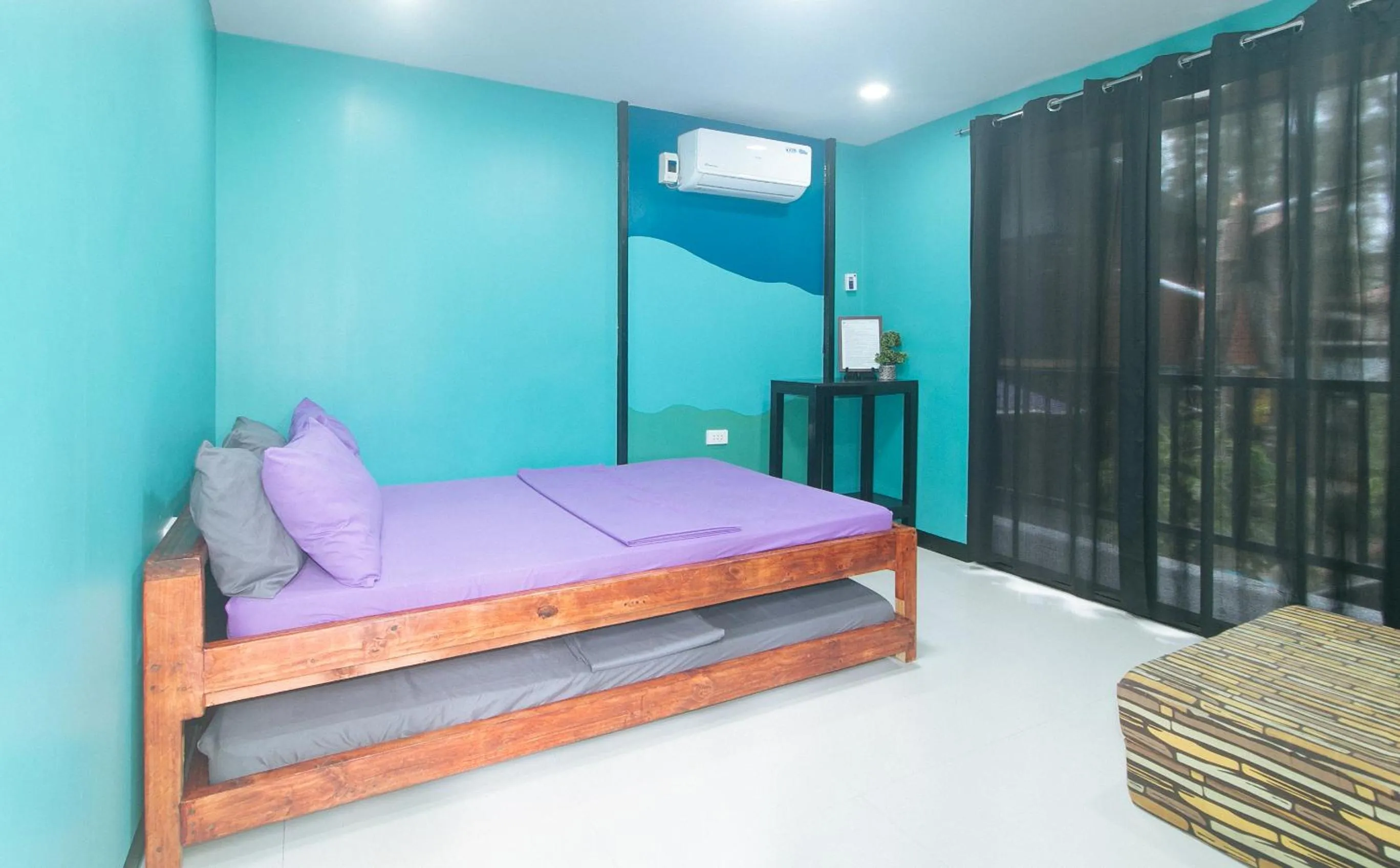 Photo of the whole room, Bed in RedDoorz @ Dolce Cabanas Beach Resort