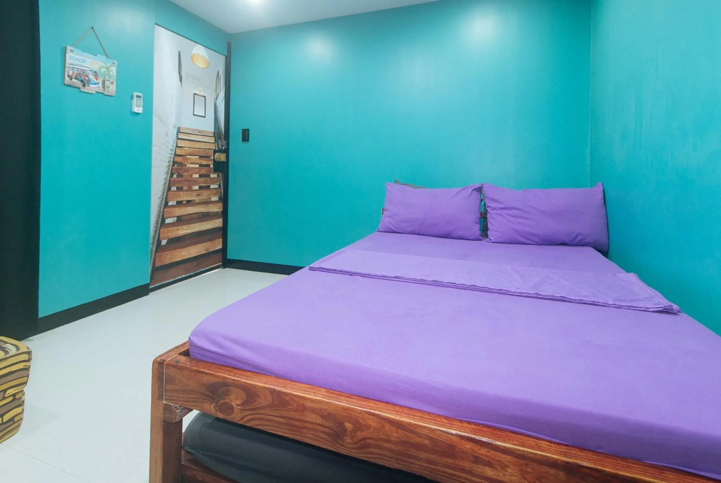 Photo of the whole room, Bed in RedDoorz @ Dolce Cabanas Beach Resort