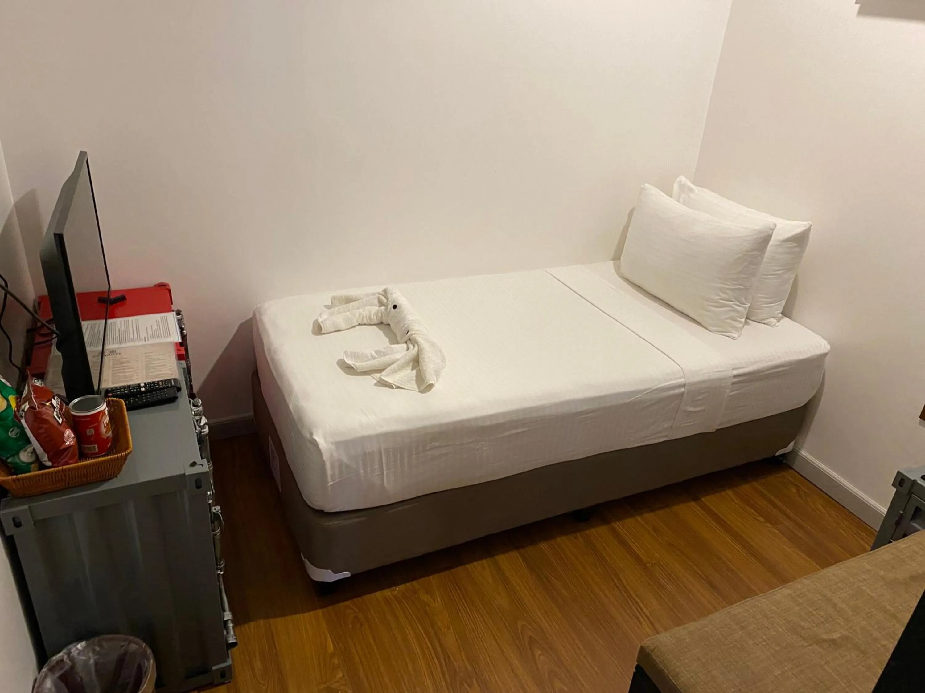 Bed in Lighthouse Point Hotel