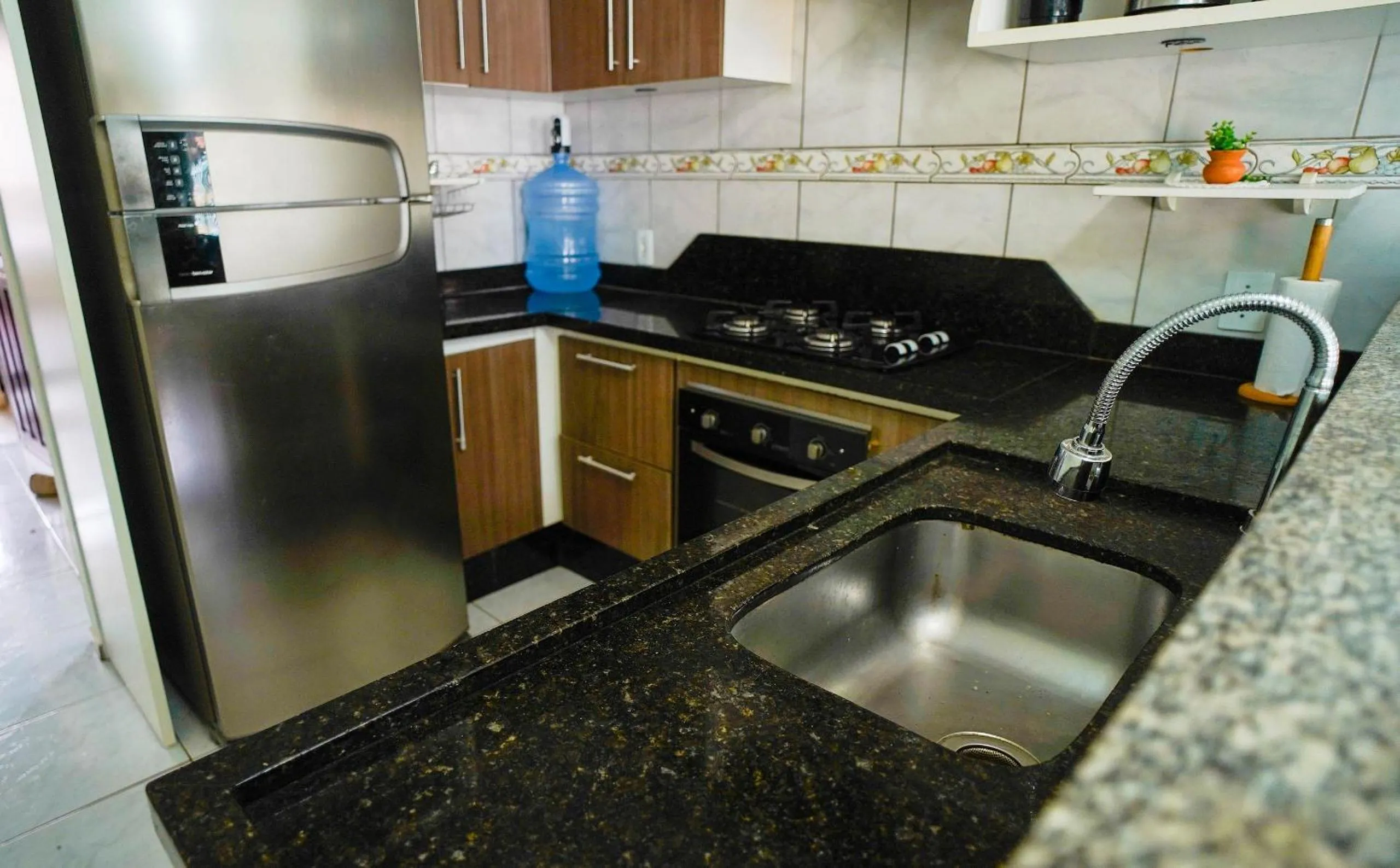 Kitchen or kitchenette in Ótima casa apenas 50metros da praia - em Balneário Piçarras